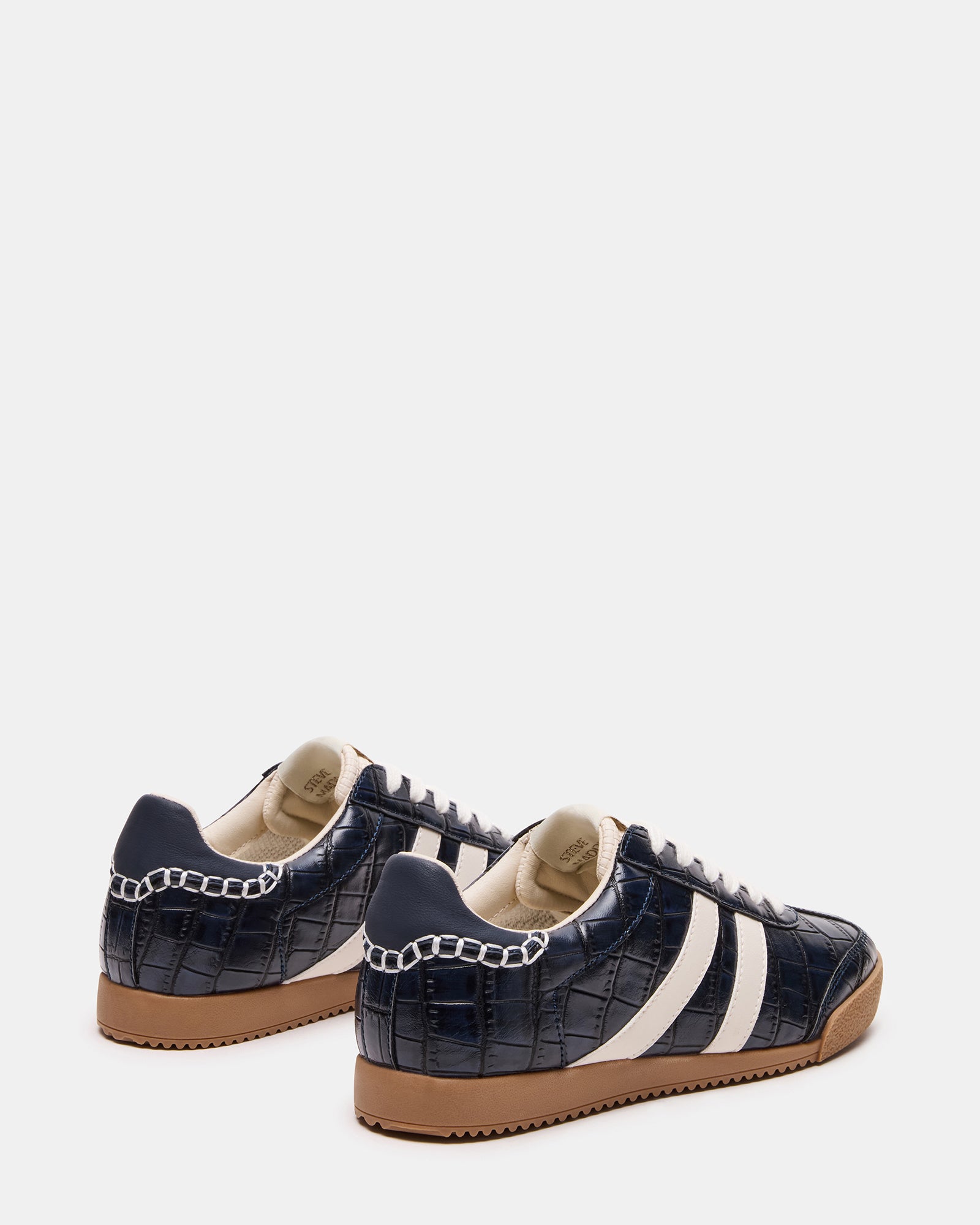Styled pair of HUDSIN sneakers perfect for casual and dressier outfits