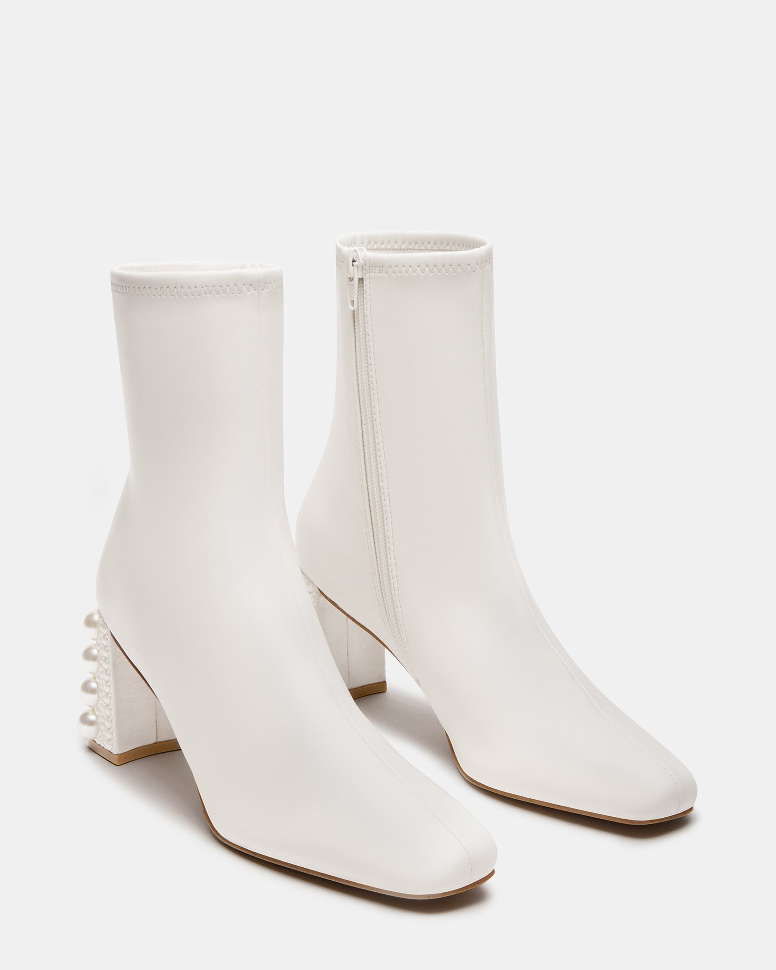 Womens ankle boots styled with denim for a trendy look.