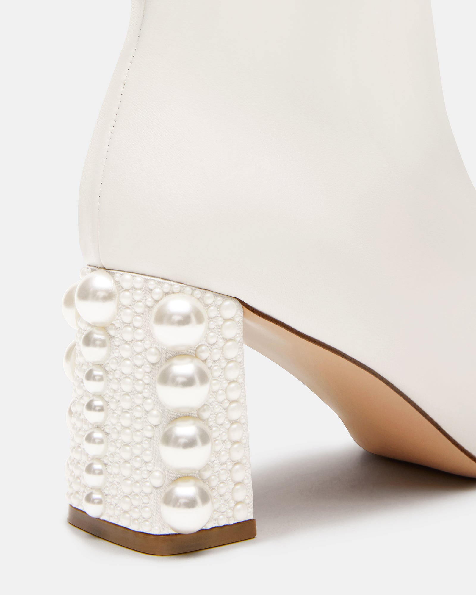 Side view of HUSH vegan leather cowgirl boots ideal for casual outings.