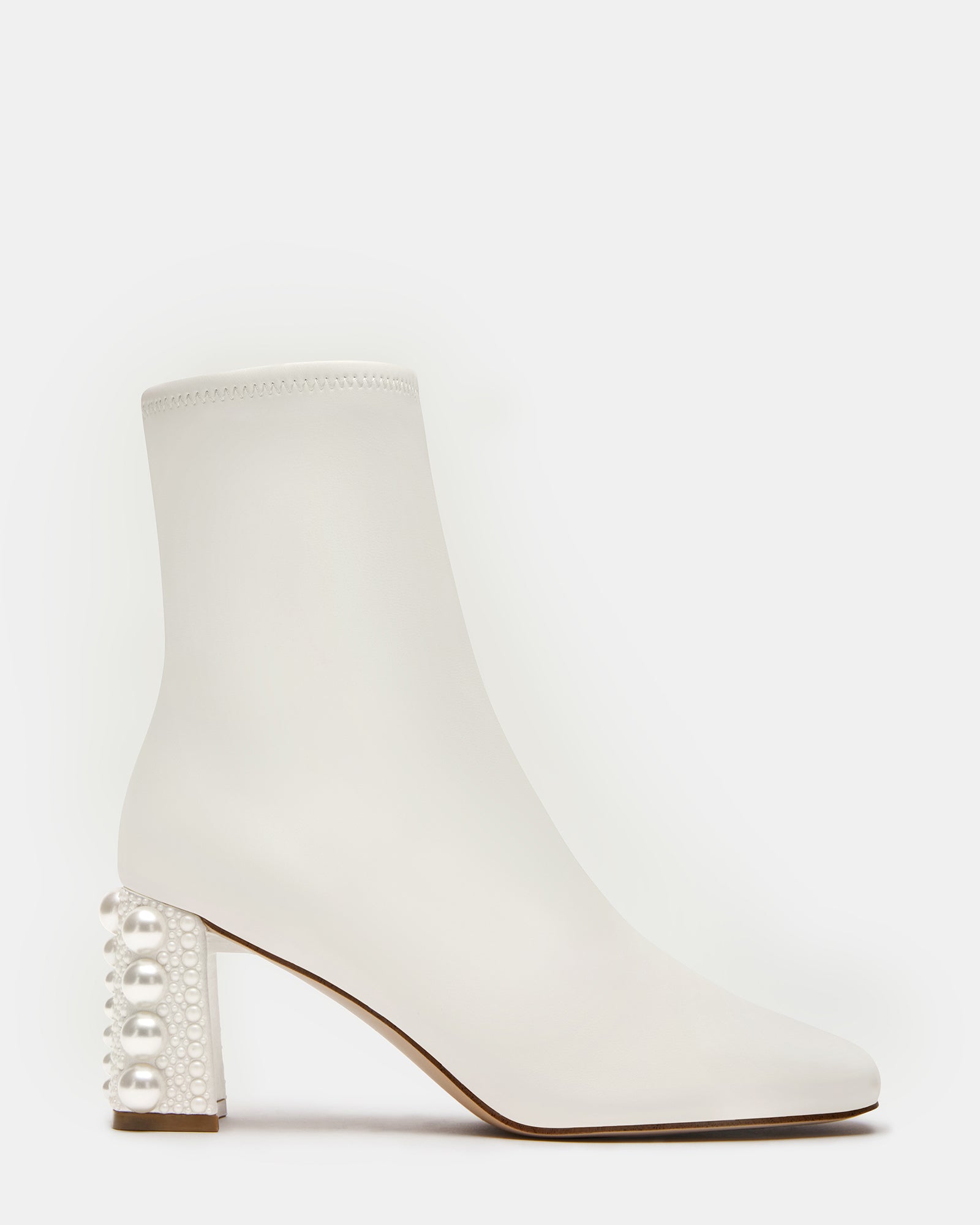 Side view of HUSH vegan leather cowgirl boots ideal for casual outings.