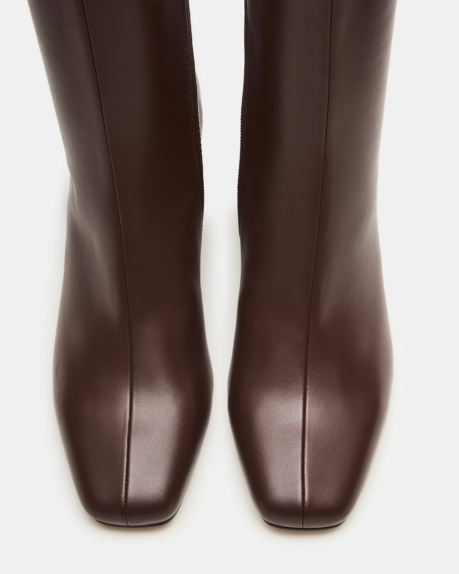 Brown womens ankle booties with side zip detail styled for weekend outings.