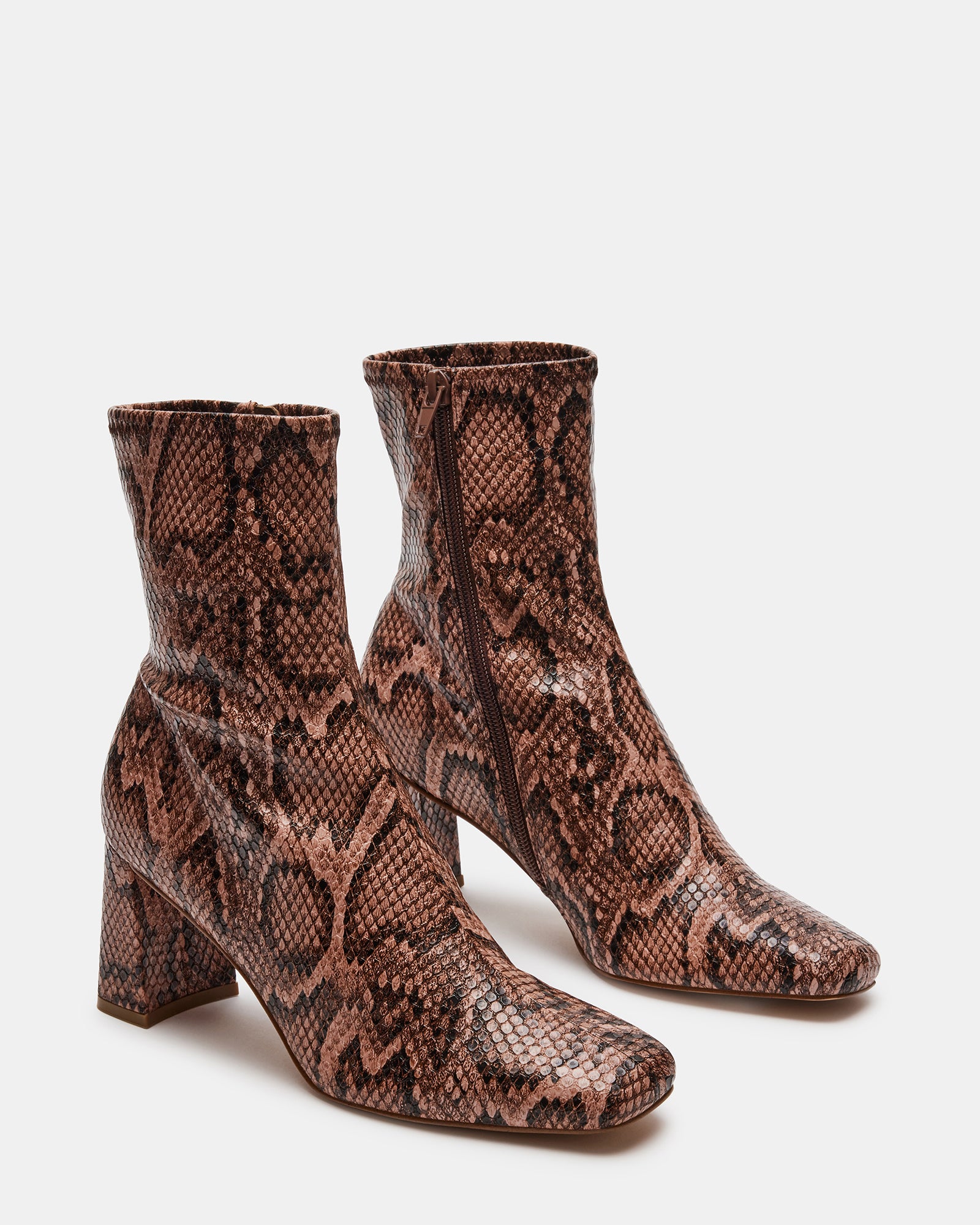 Side view of the booties highlighting the 2.75-inch heel and sleek design.