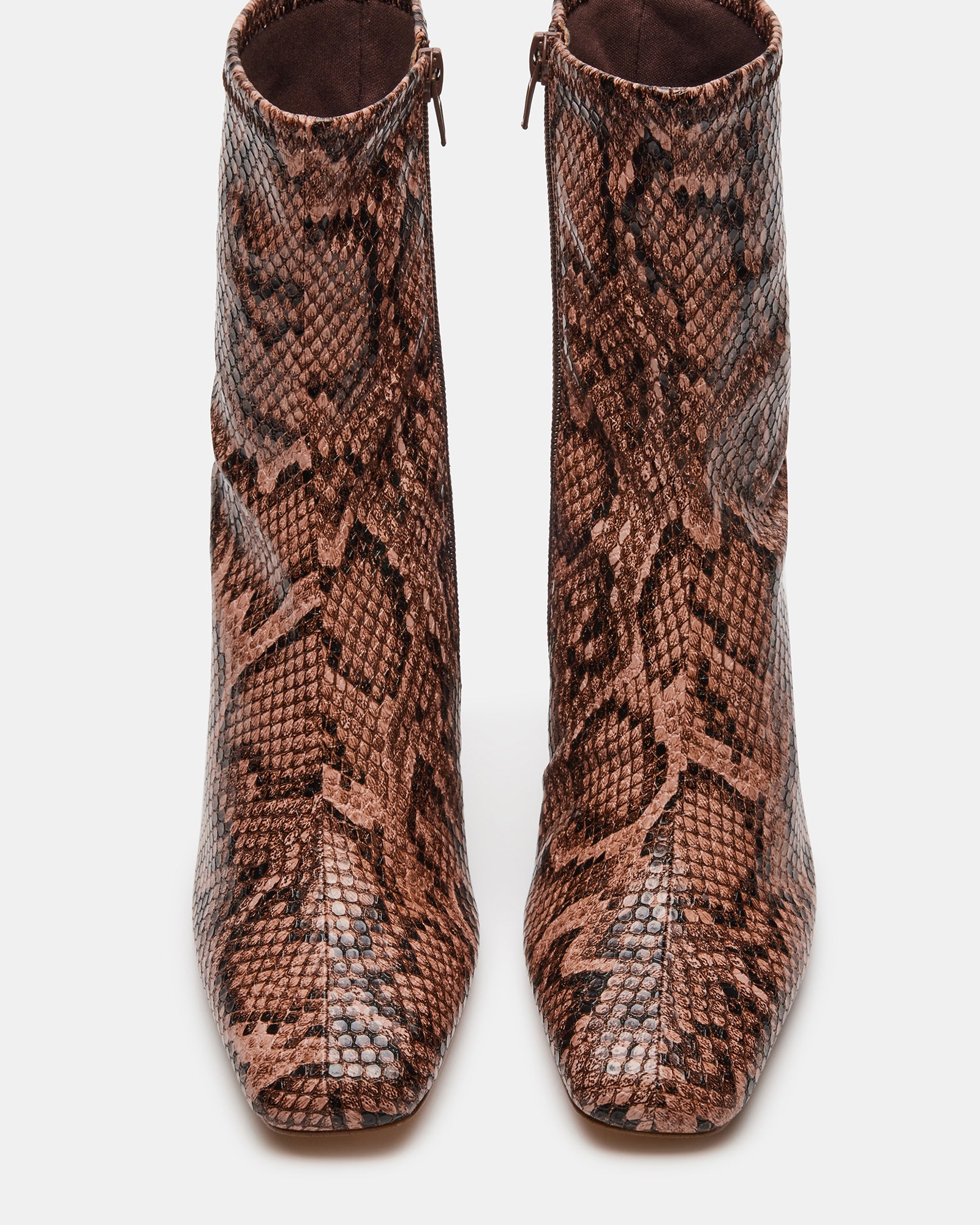 Close-up of the chic ankle boots showcasing the vegan leather texture.