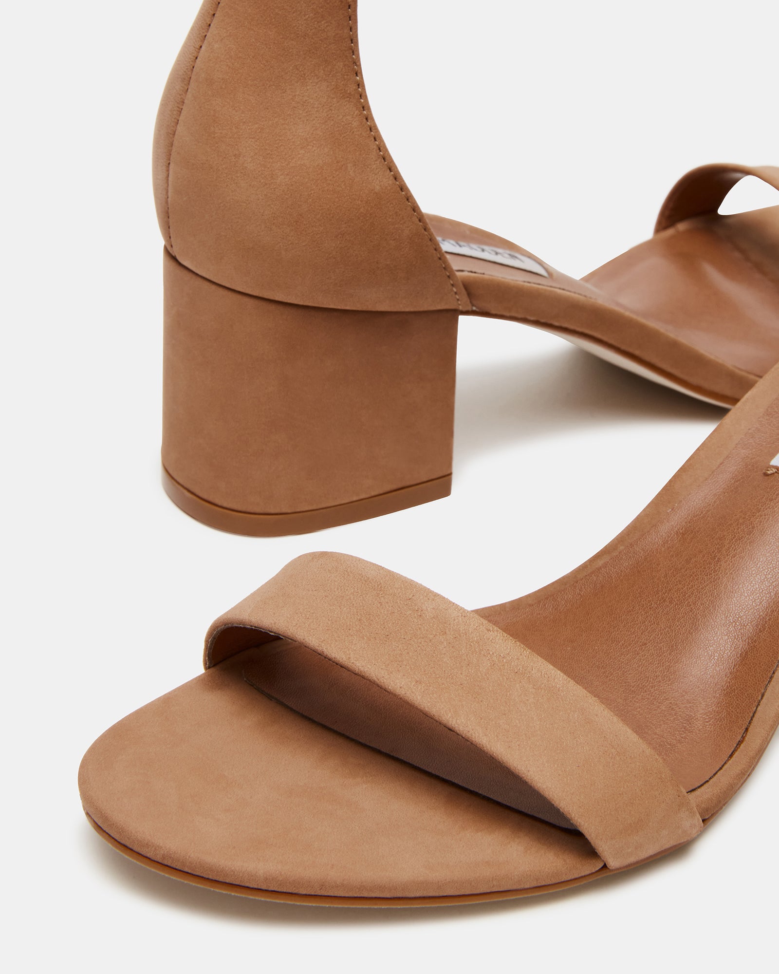 Fashionable women’s heels with tan nubuck finish, suitable for formal and casual occasions