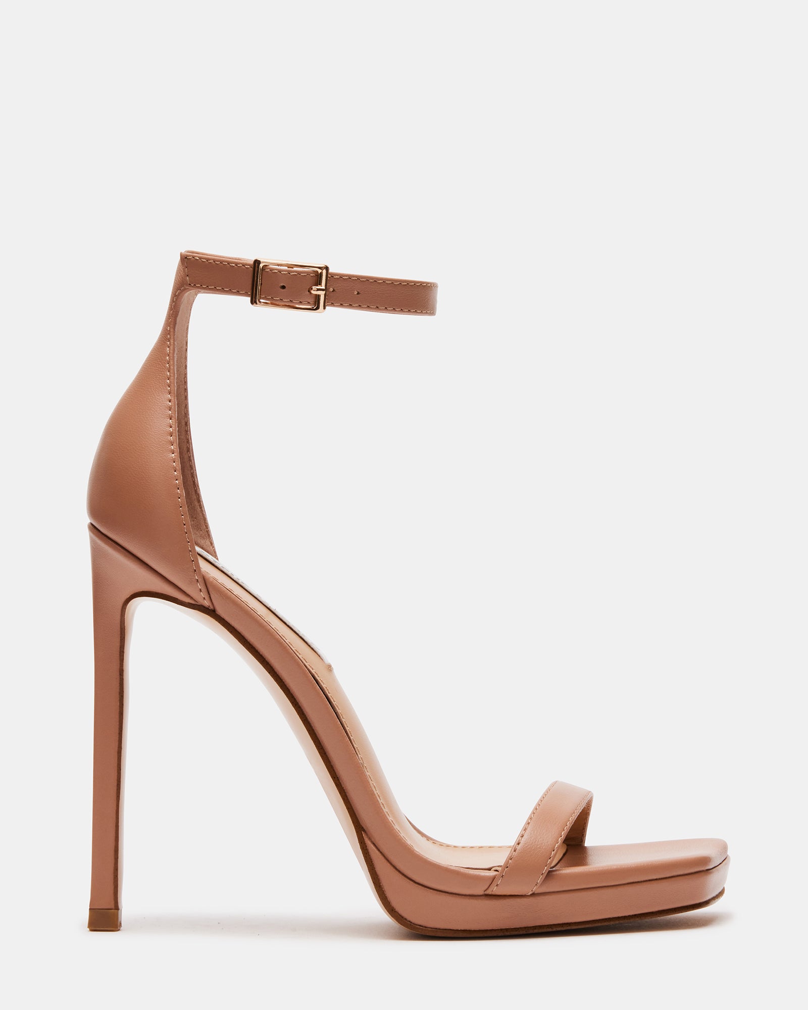 Tan leather dress sandals from side view showing stiletto heel