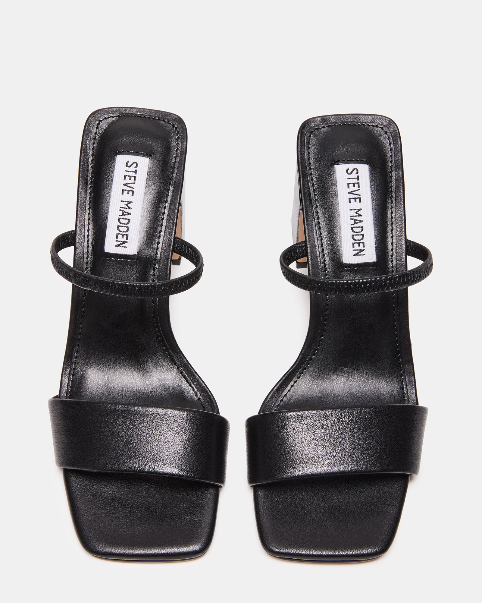 Jaden black block heel sandals angled to show square toe and leather straps