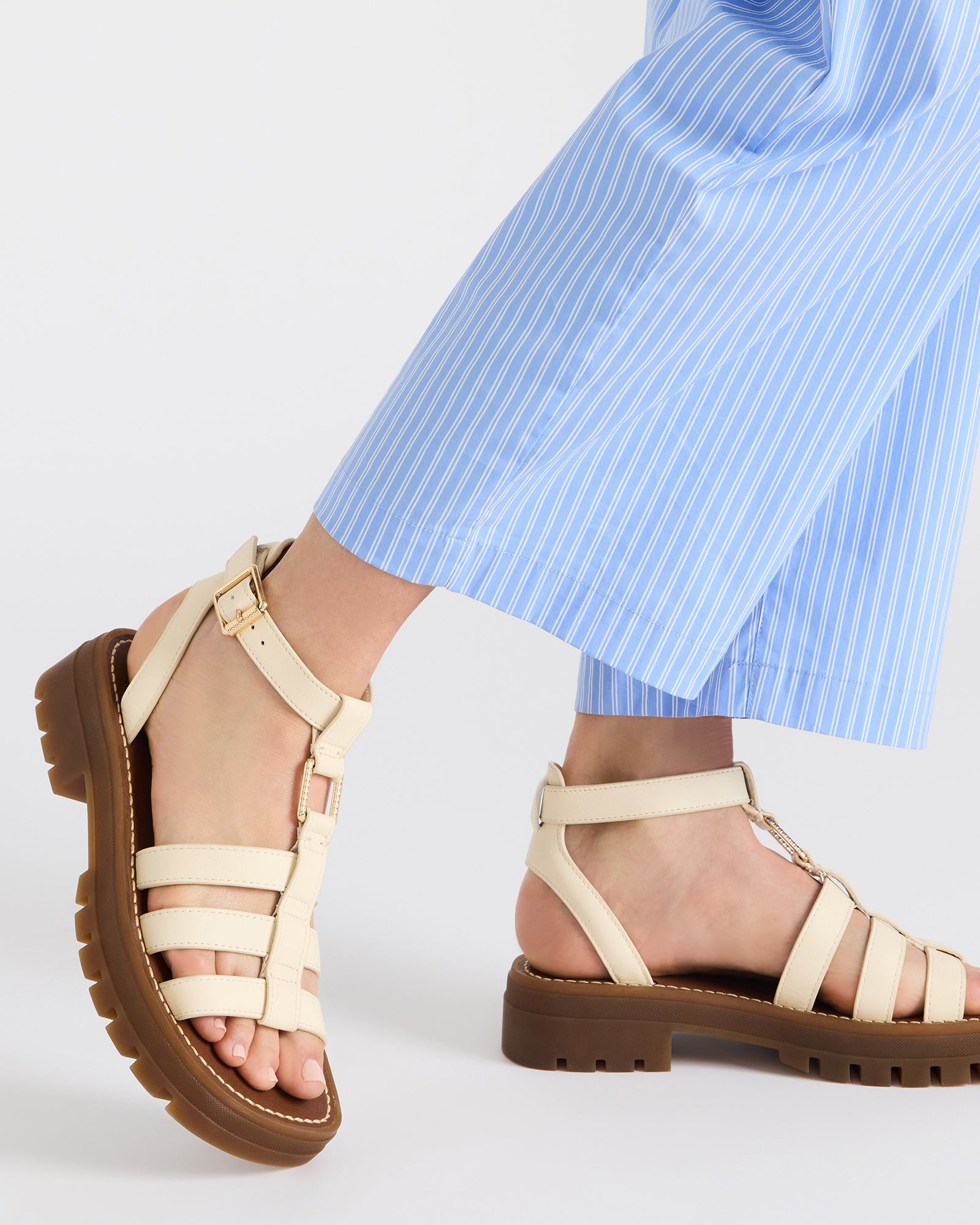 Close-up of strappy sandals showing square toe and cushioned heel from the Jarelli collection