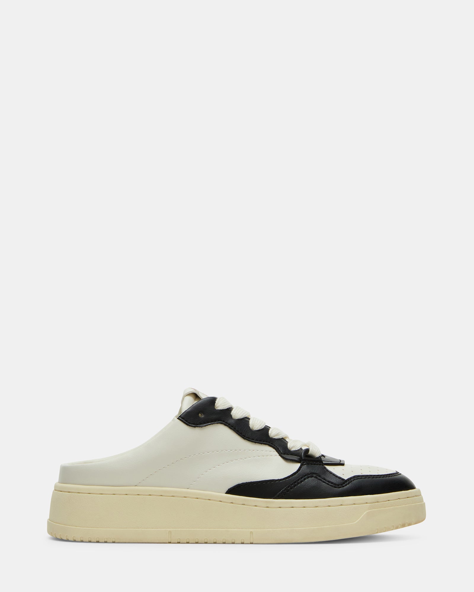 Side view of black Jensen slip-on sneakers showcasing its stylish design.