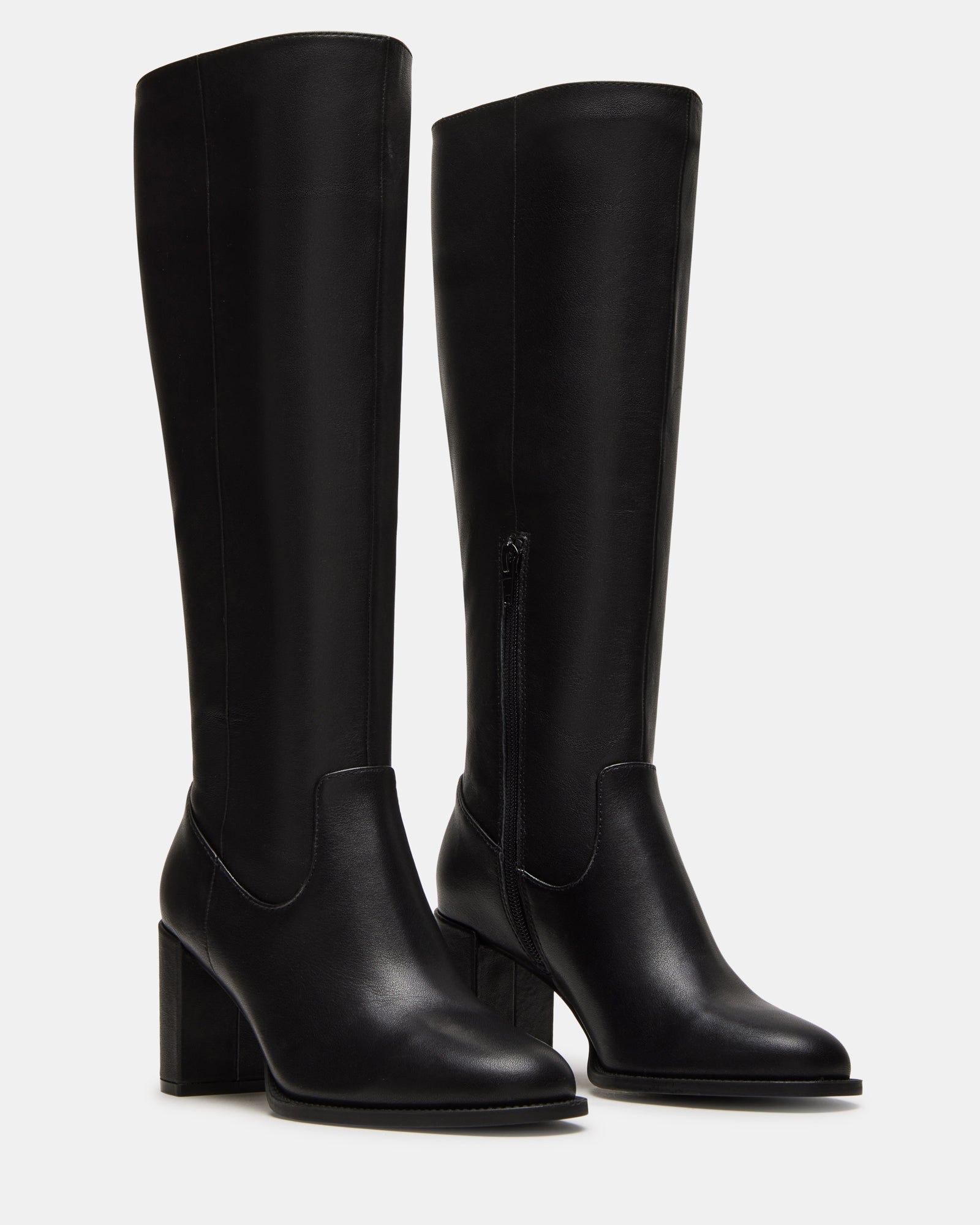 Stylish outfit featuring Jovana black leather knee-high boots.