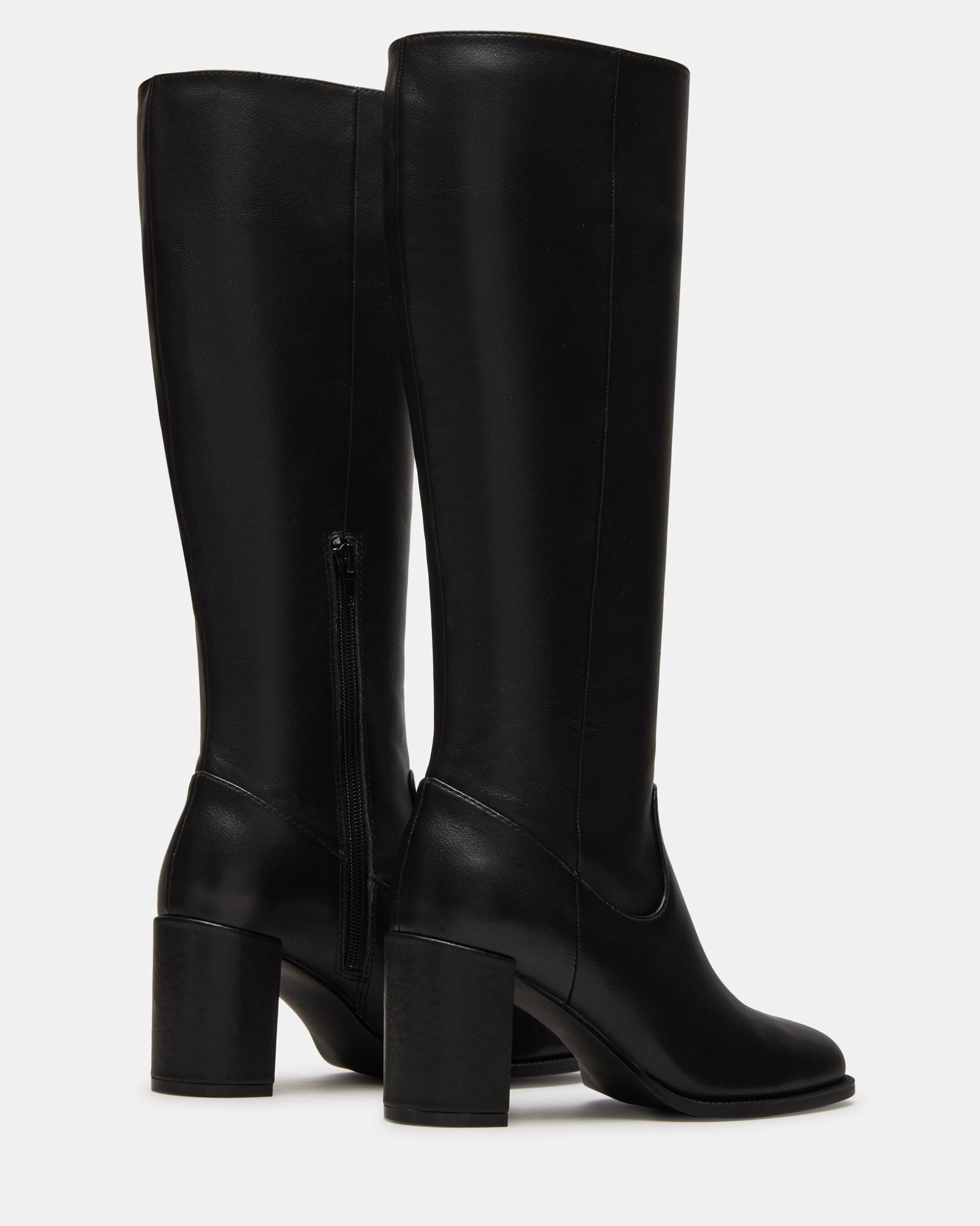 Stylish outfit featuring Jovana black leather knee-high boots.