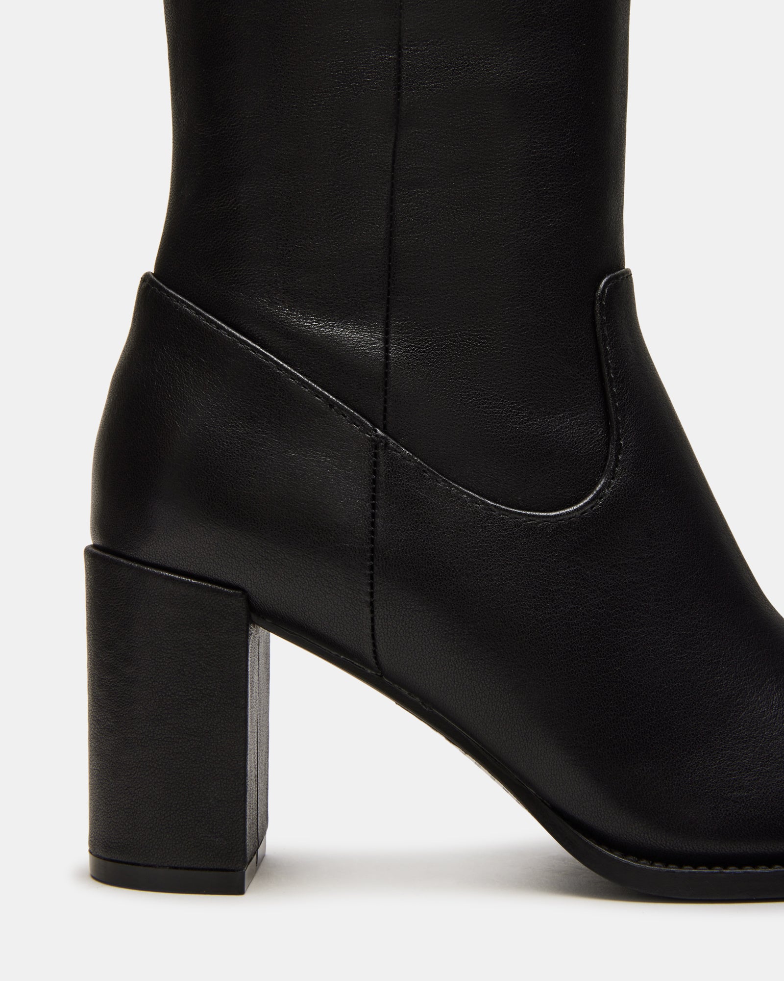 Side view of Jovana black leather knee-high block heel boots for women.