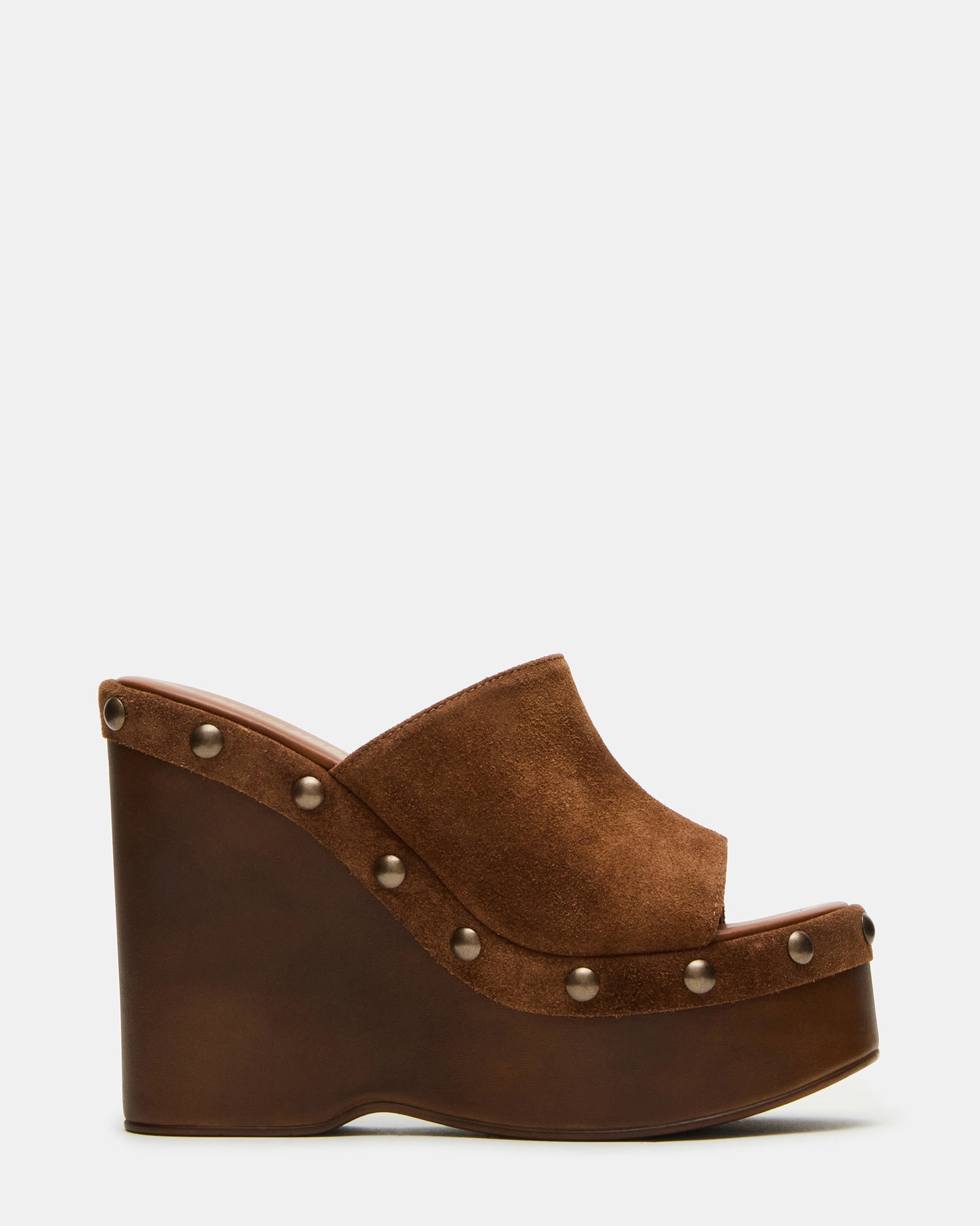 Jovie suede mules styled with cropped jeans for a casual look