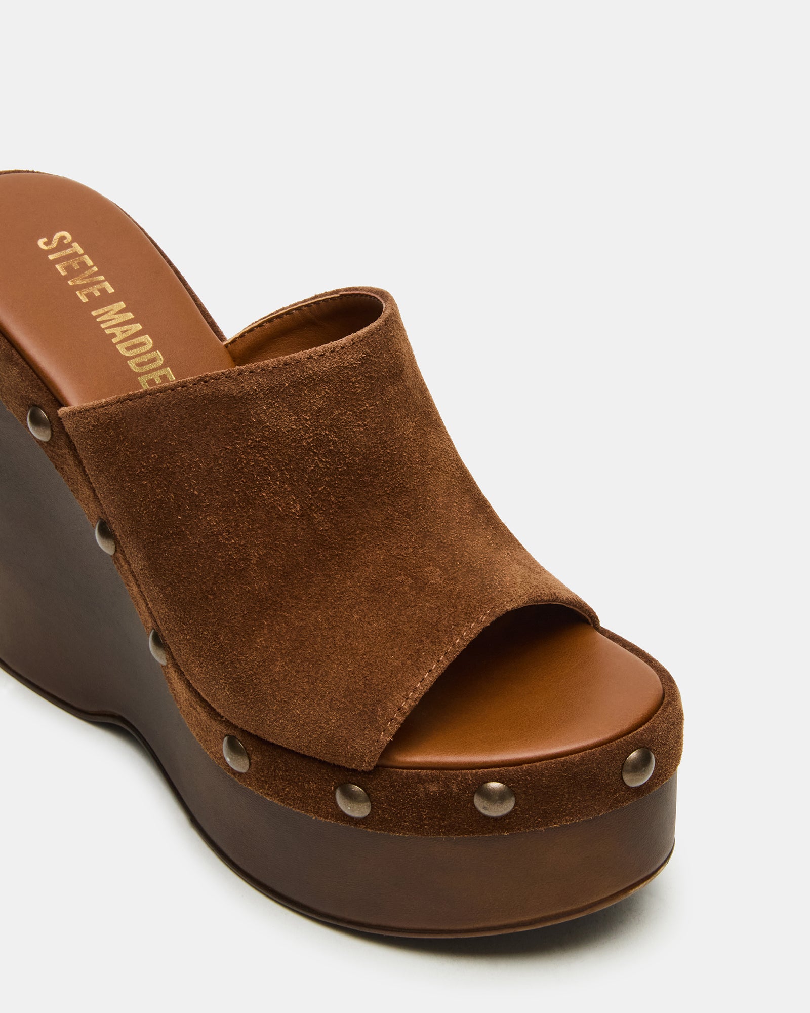 Chestnut suede mules paired with a summer dress for brunch outfits