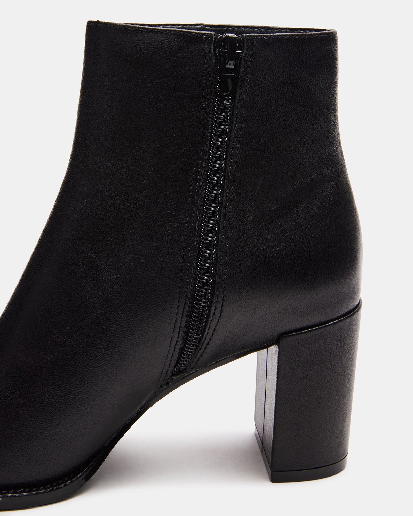 Close-up of the black leather bootie showcasing the sleek design.