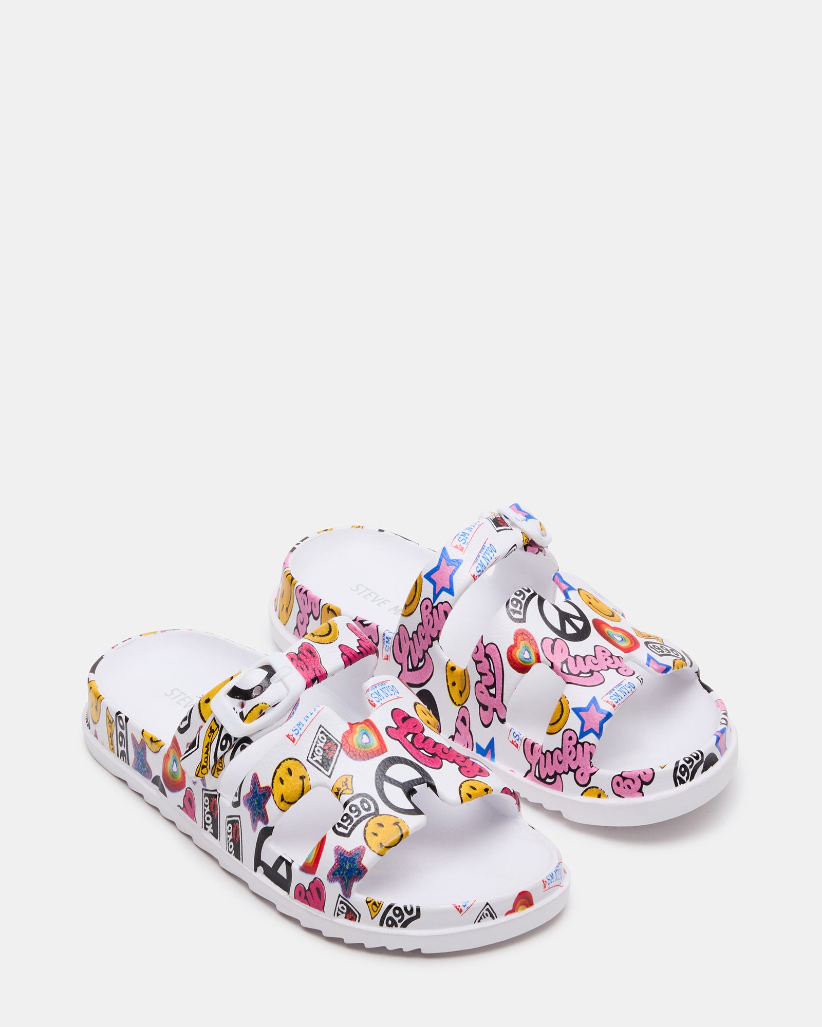 Kids wearing Spirit White Multi sandals during outdoor play