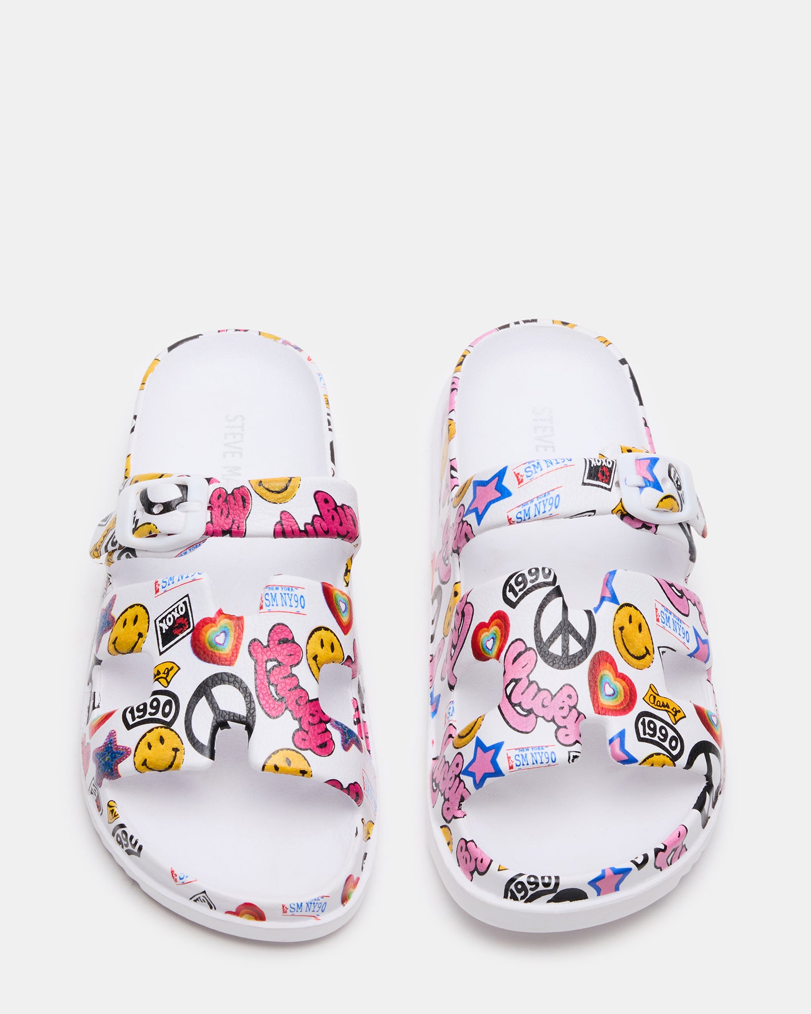 Close-up of Spirit White Multi kids slide sandals showcasing flatform design