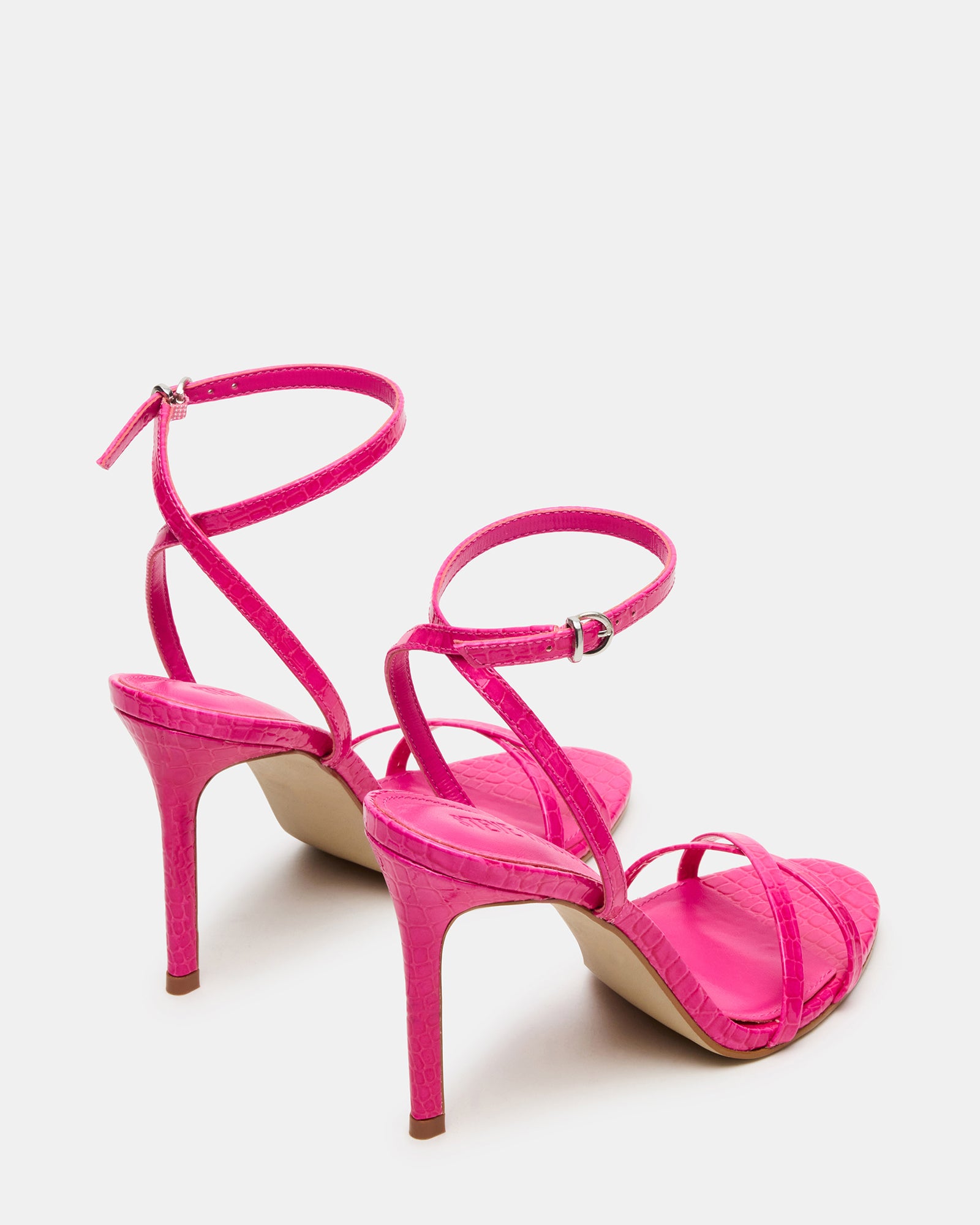 Front view of stylish JYPSEY heels with rounded toe and textured synthetic material