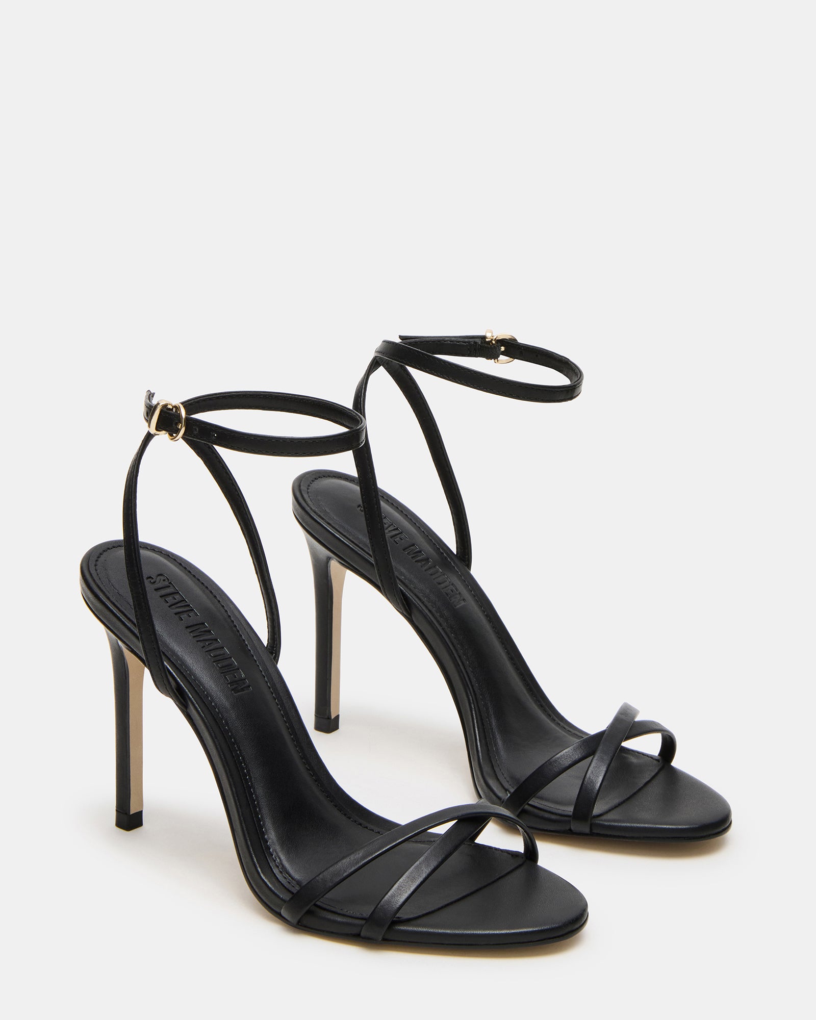 Fashionable black leather heels with strap design for formal events