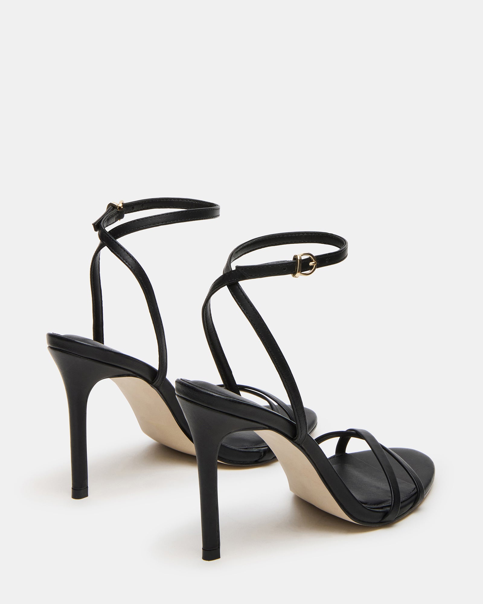 Fashionable black leather heels with strap design for formal events