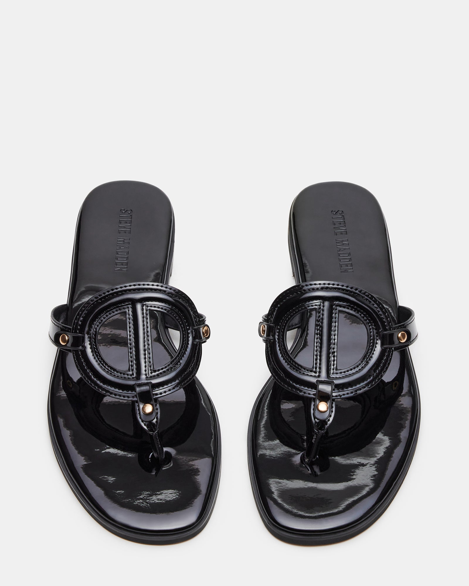 Top-down view of the sandals highlighting the synthetic upper and sleek finish