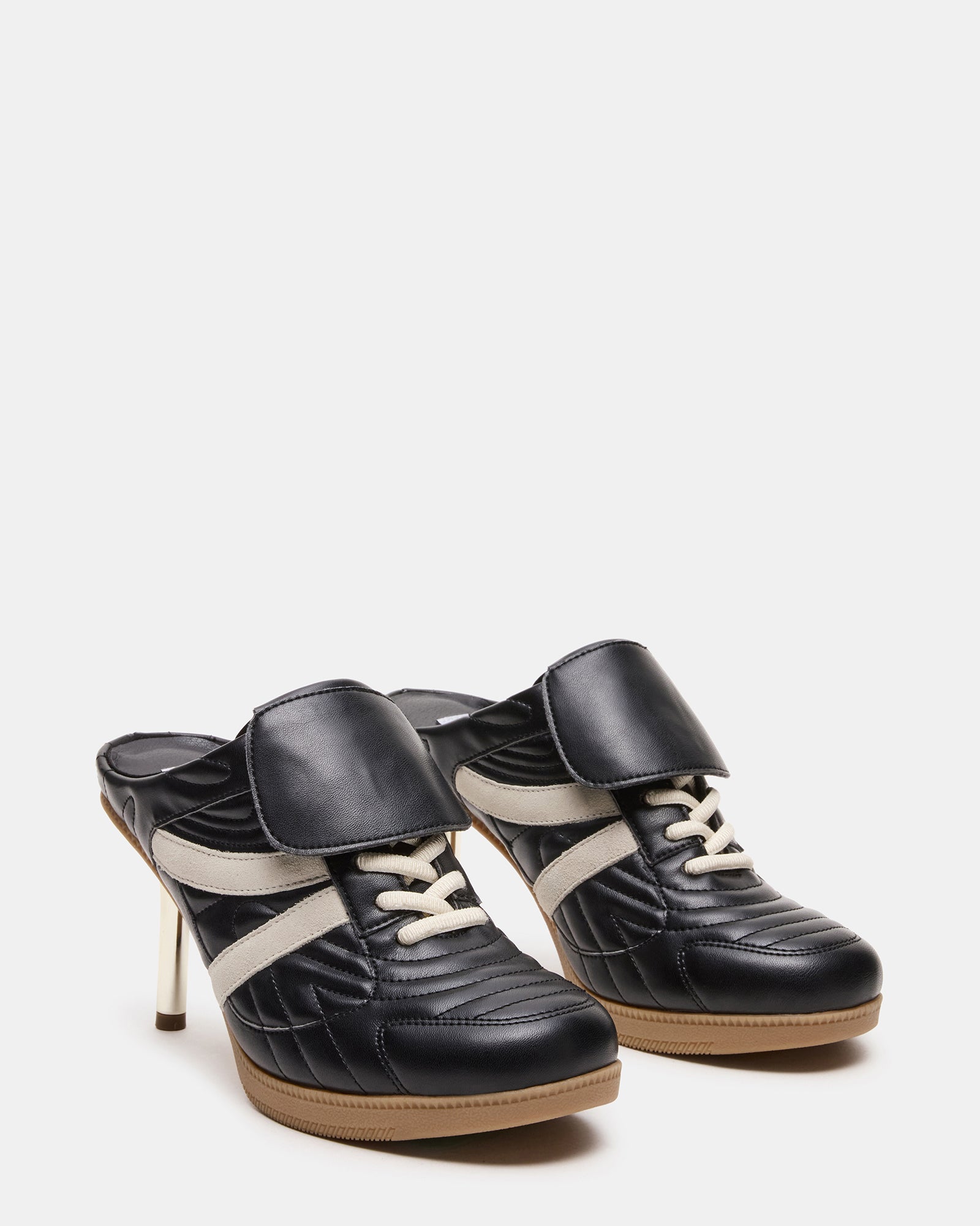 Close-up of KADIN Luxe Mule Sneakers, highlighting the lace-up feature and round toe.
