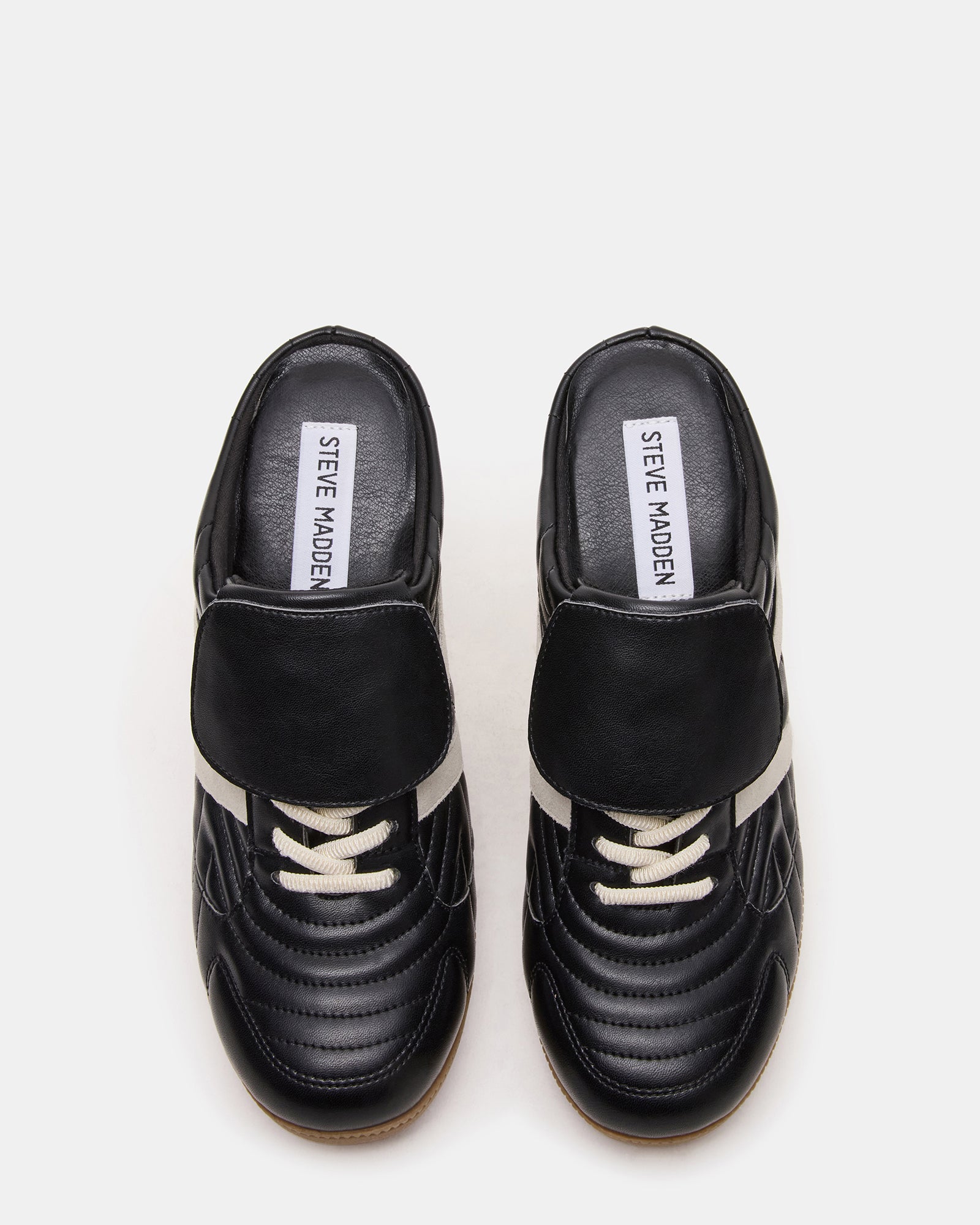KADIN Luxe Mule Sneakers from the side, showcasing the sleek design and heel.