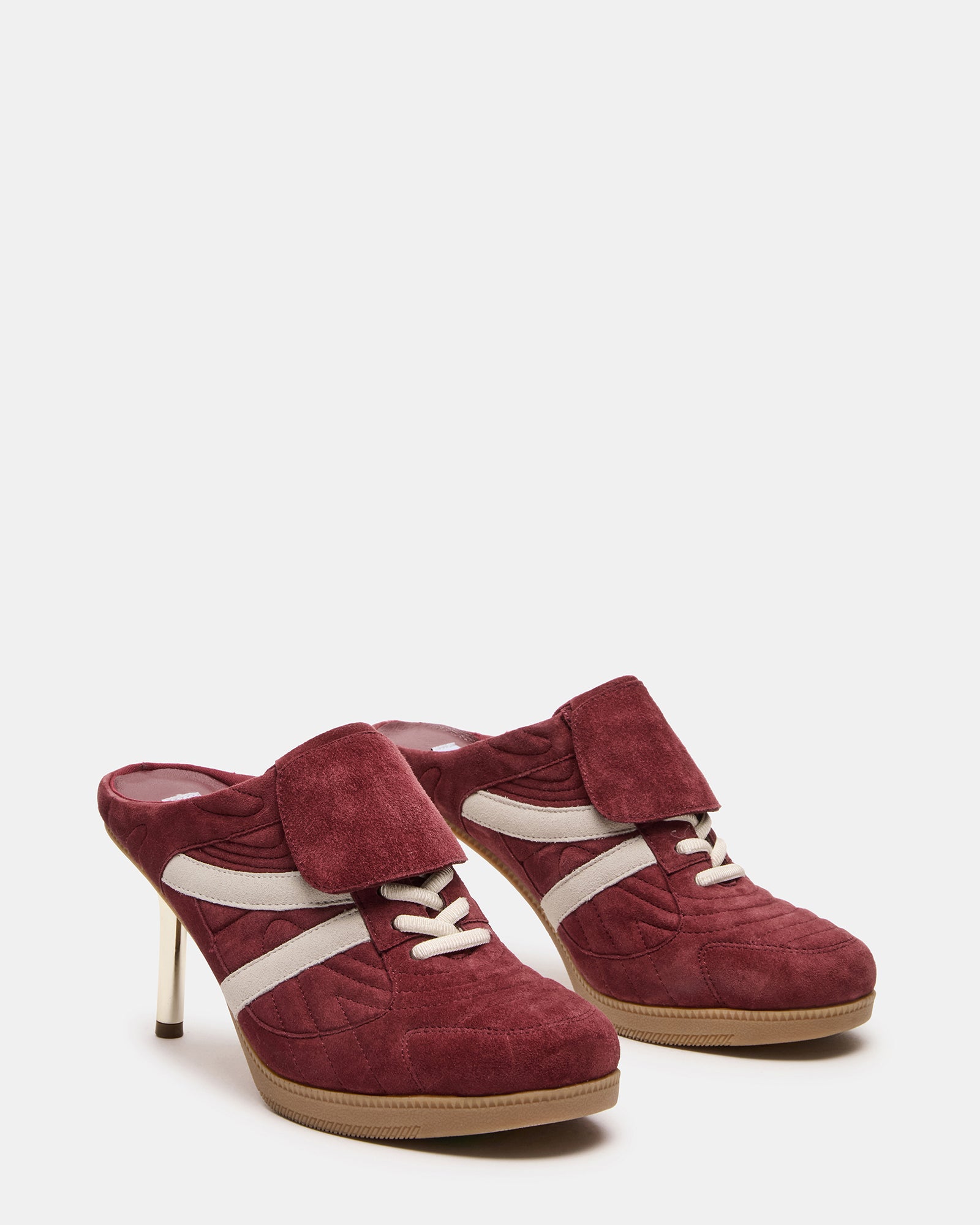 Close-up of the Kadin heeled sneakers highlighting the suede material.