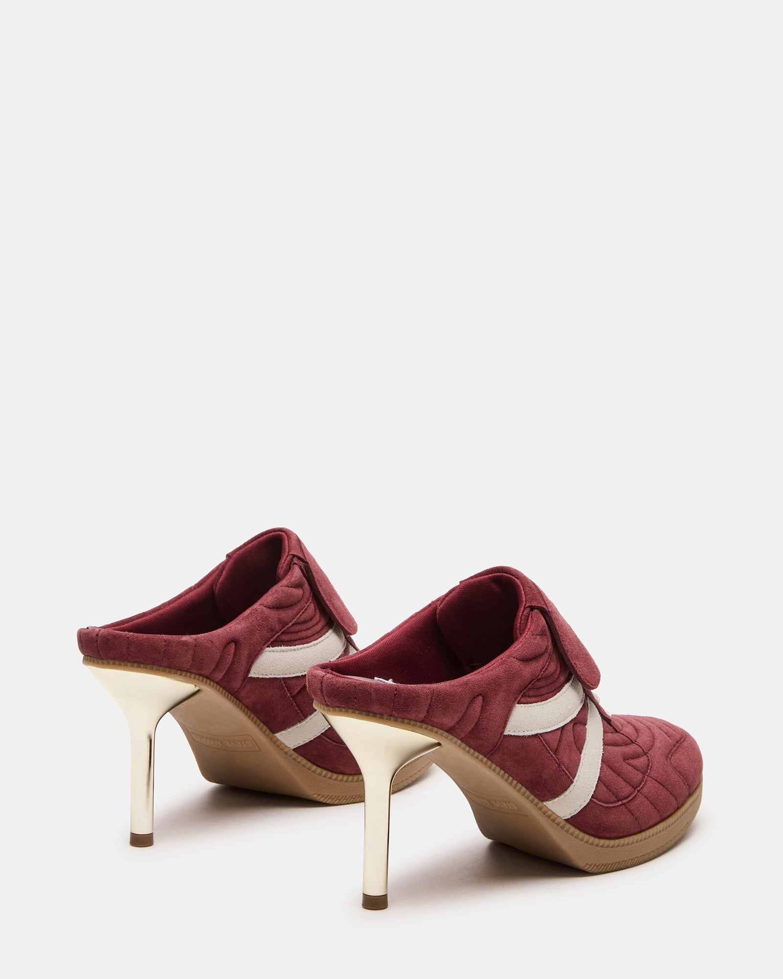 Close-up of the Kadin heeled sneakers highlighting the suede material.