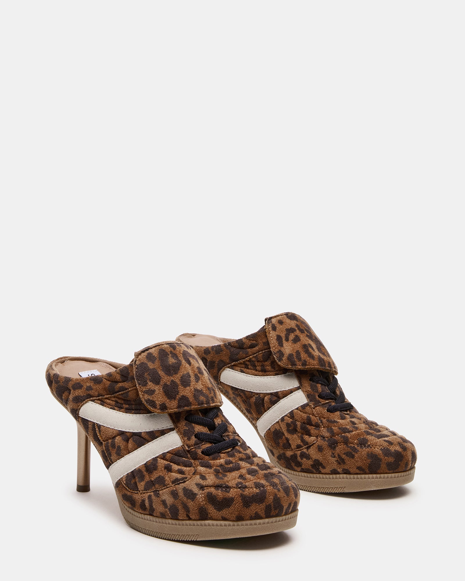 Close-up of sneaker mule shoes textured suede and lace detailing