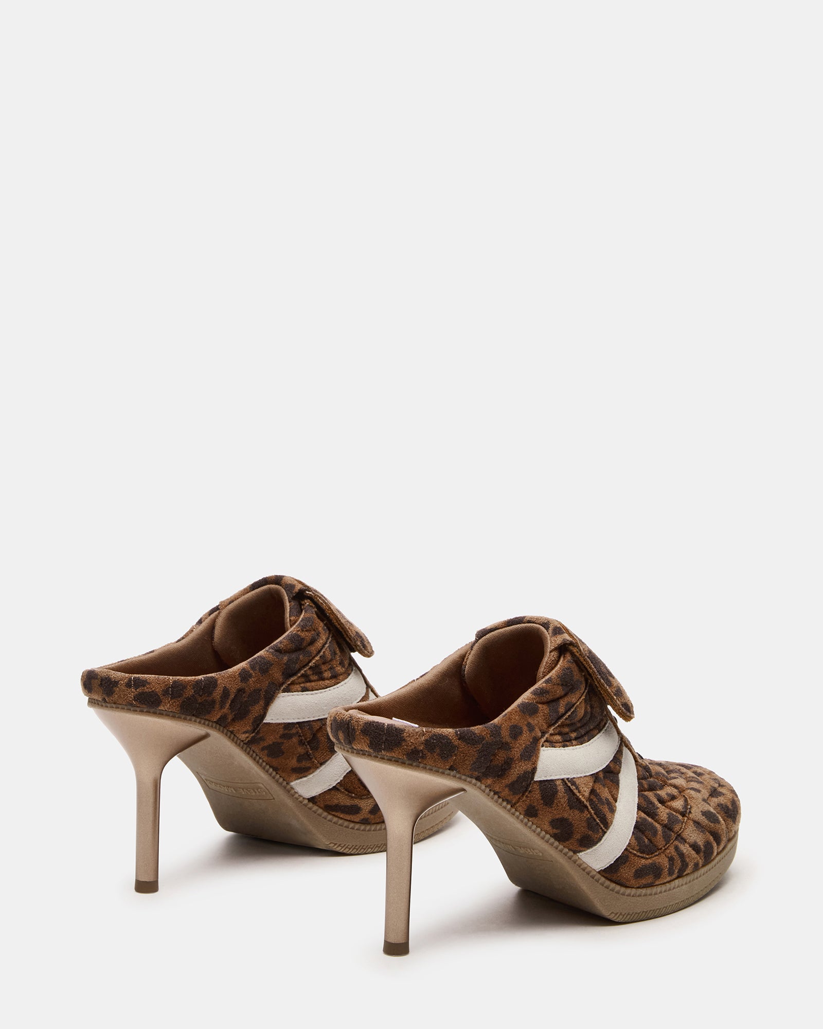 Close-up of sneaker mule shoes textured suede and lace detailing