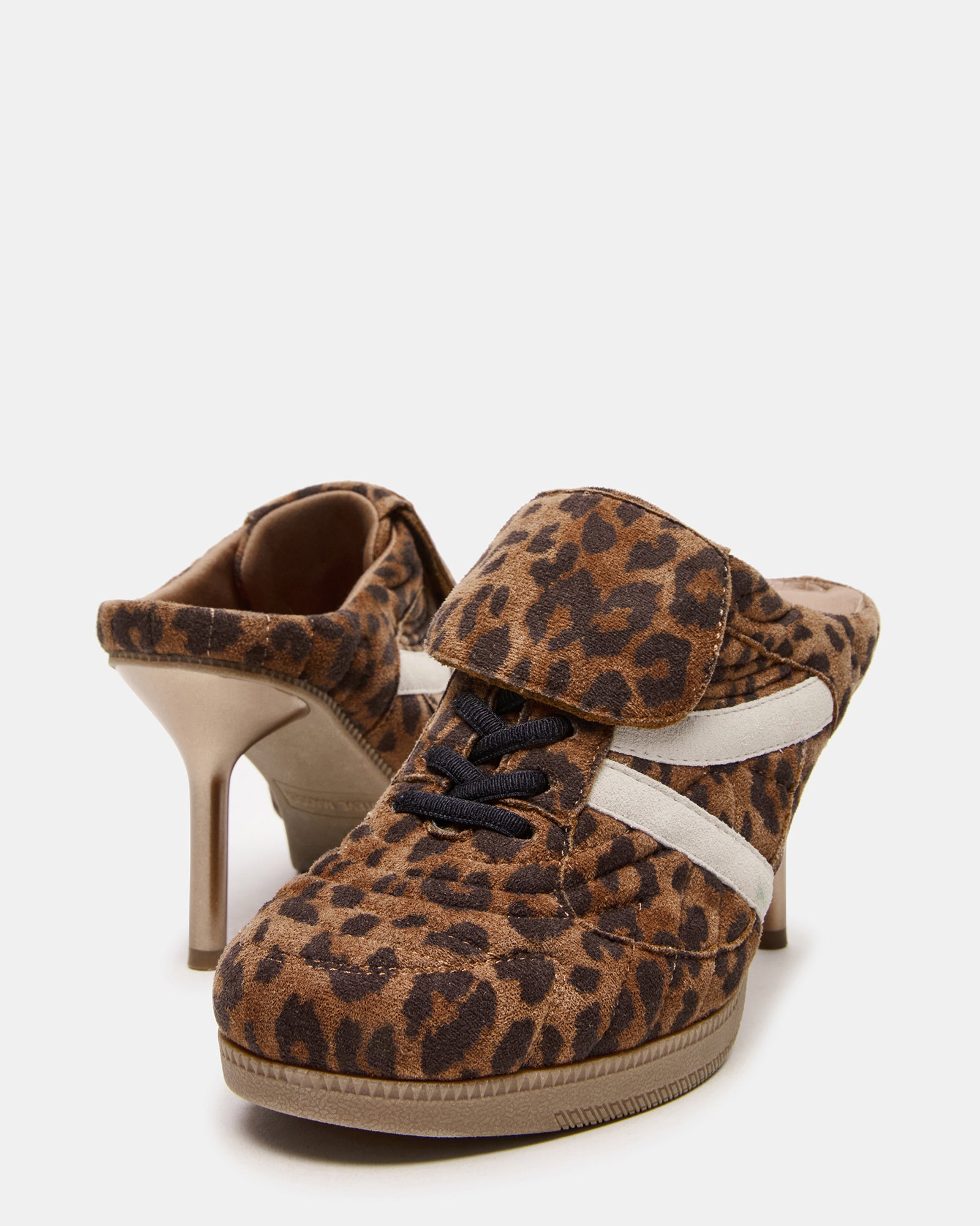 Walkable 3.75-inch heel on fashion sneakers, shot on city pavement