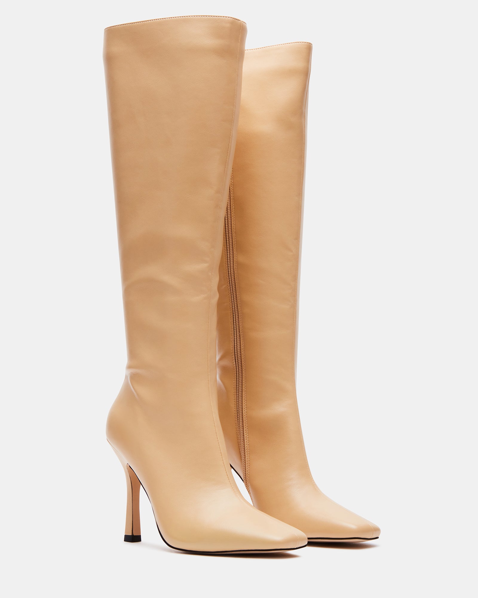 Close-up of the stretch gore and side zipper on the knee high boots