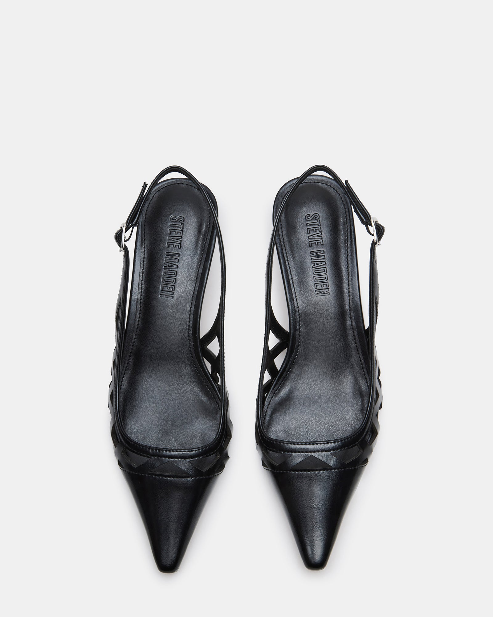 Close-up of pointed-toe black kitten heel with slingback design