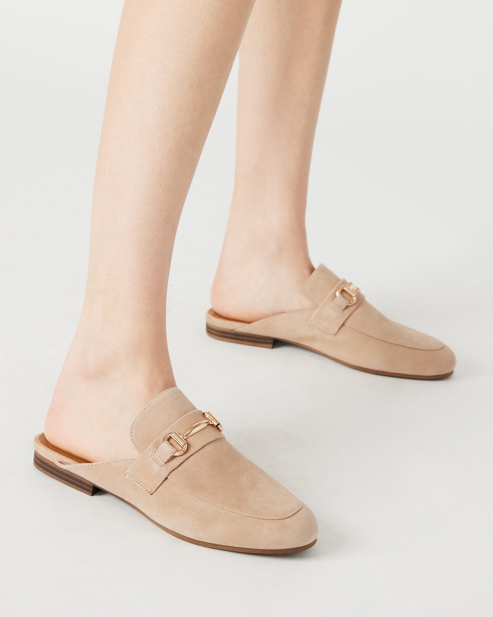 Styled outfit featuring designer loafers for men with casual trousers