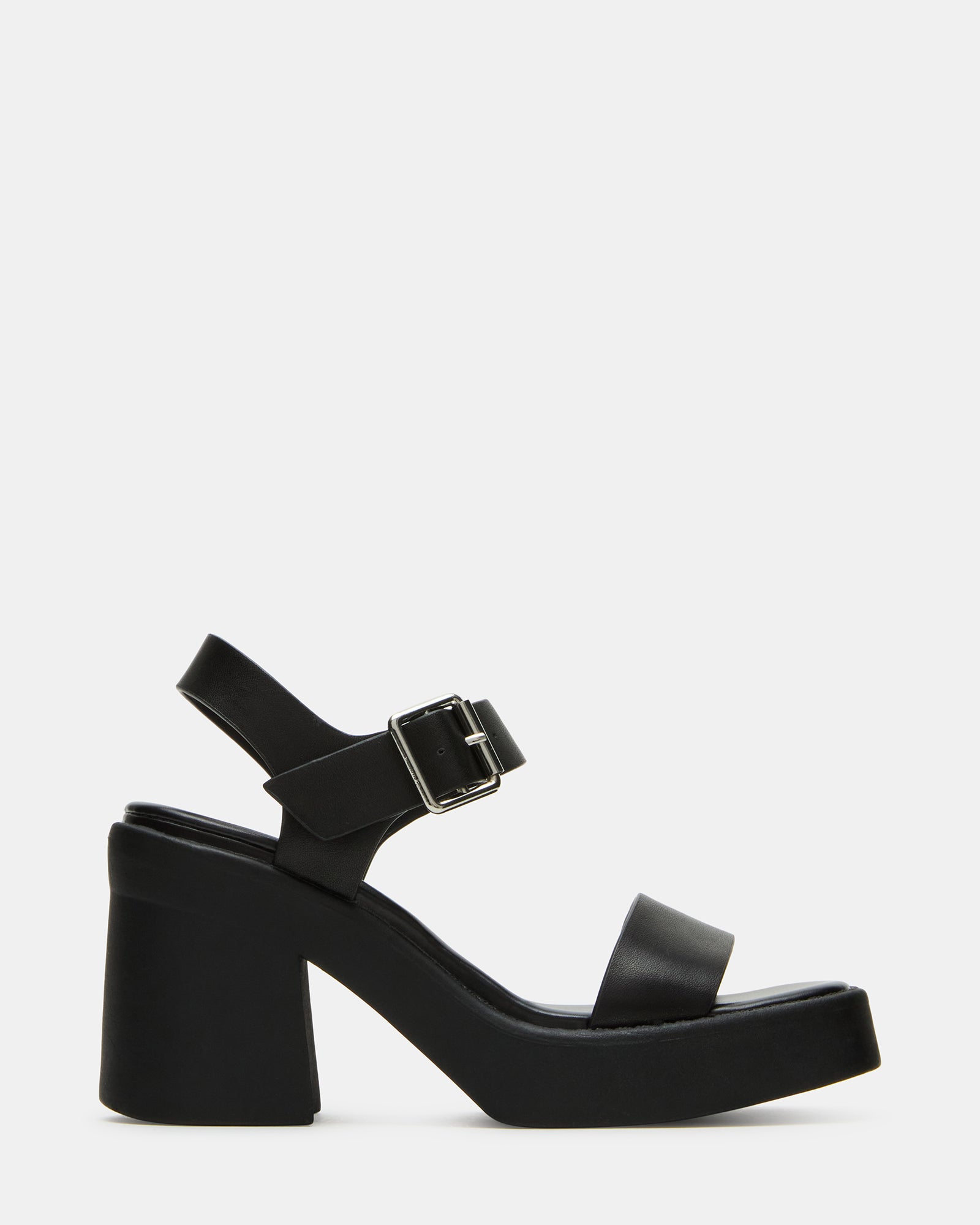 Side angle view of black leather sandals showing ankle strap and block heel