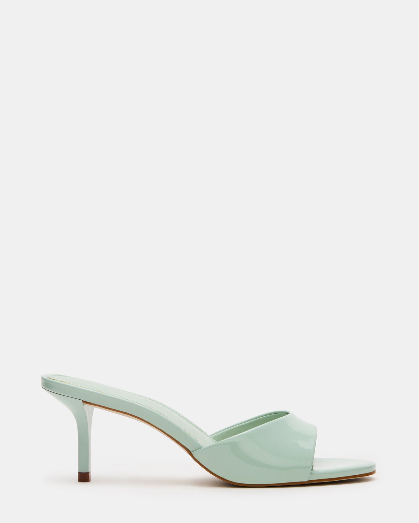 Side view of KENDRIX PISTACHIO mules with patent leather shine, ideal for women’s shoes collection