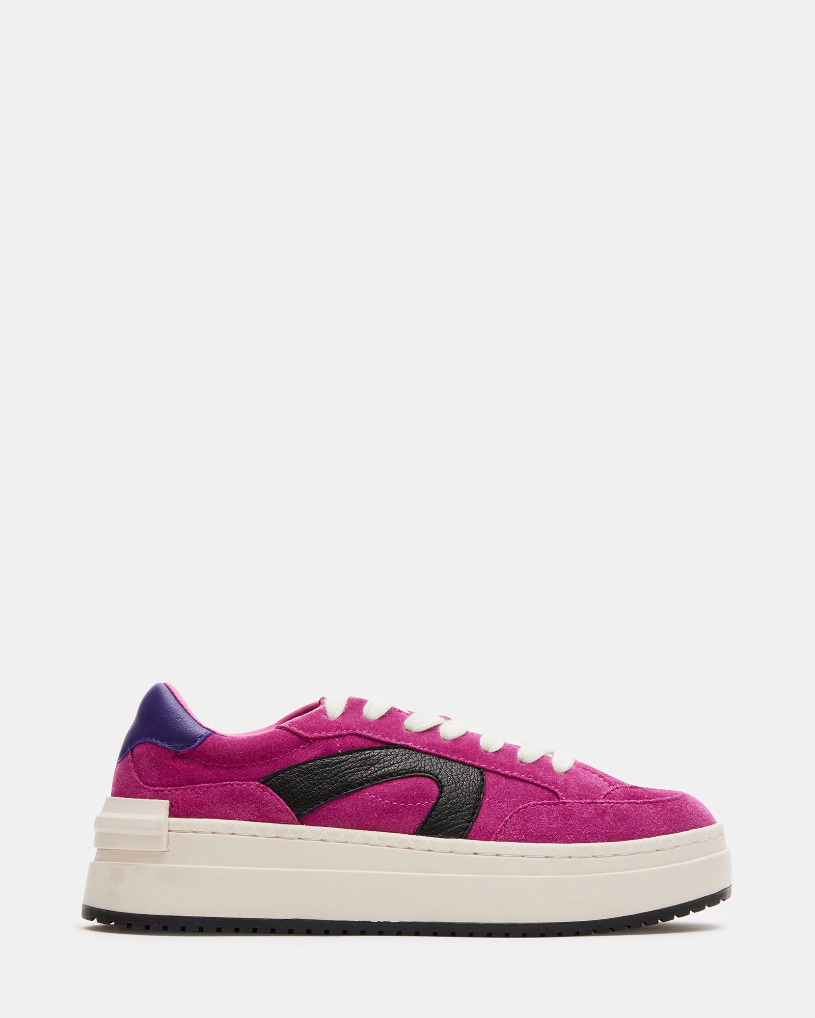 Women's pink suede platform sneakers from a side angle