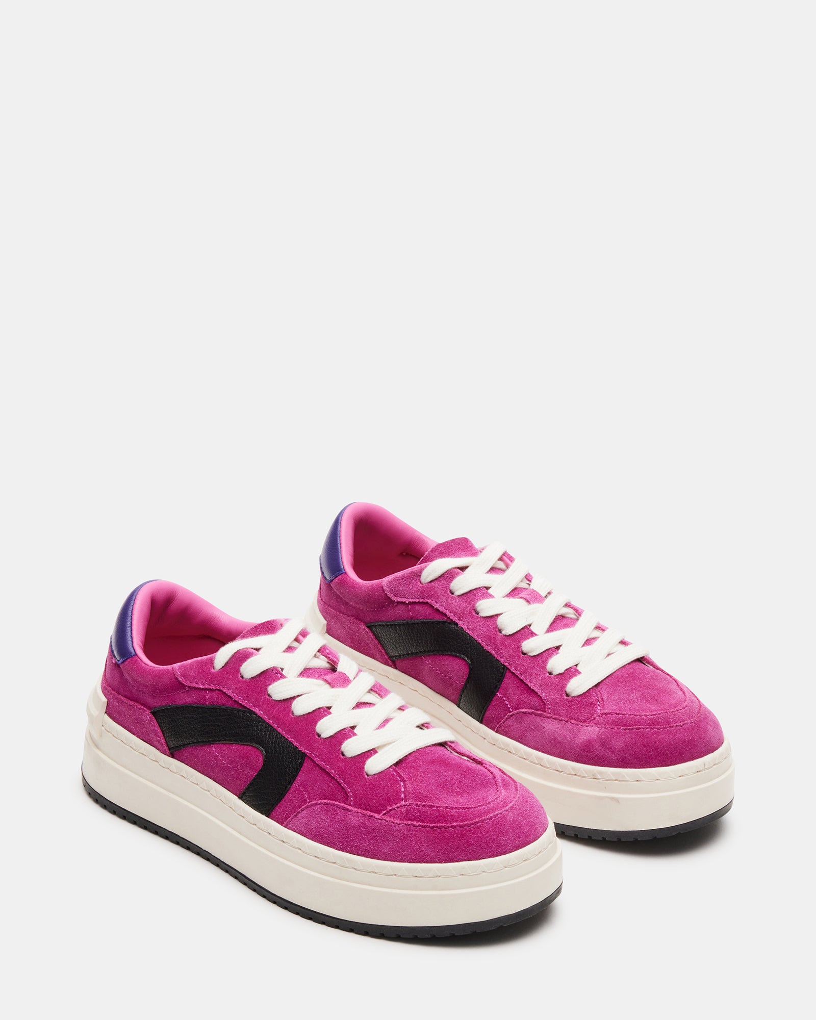 Close-up of the suede texture and lace-up detail