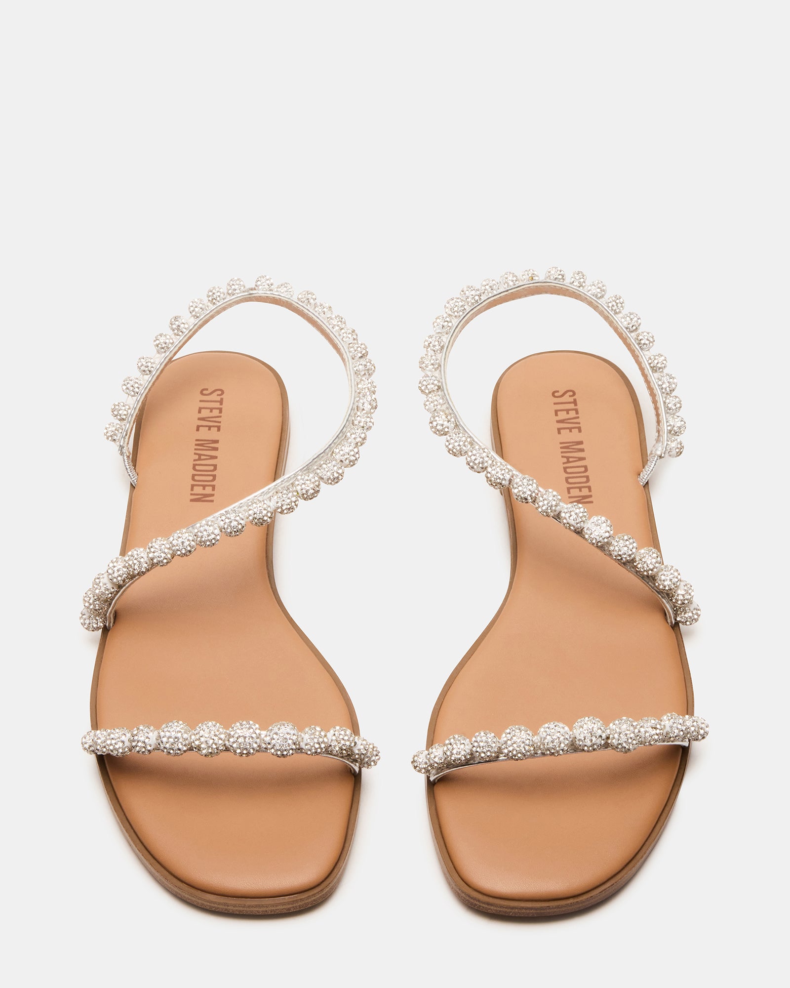 Kindred silver strappy sandals styled with a sundress for summer outfits