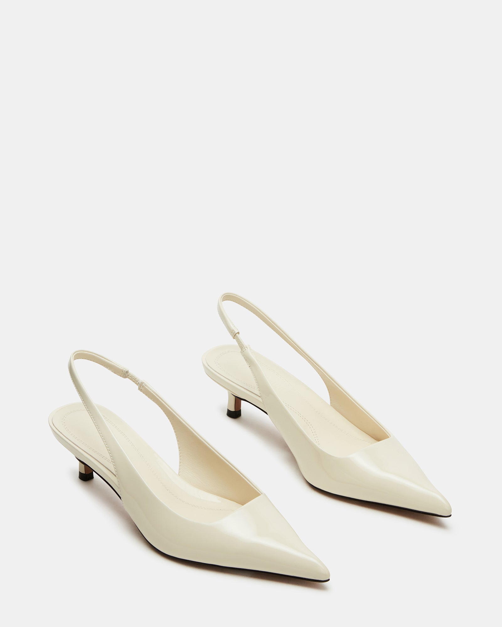 Kittie pumps styled for a chic outfit with a dress
