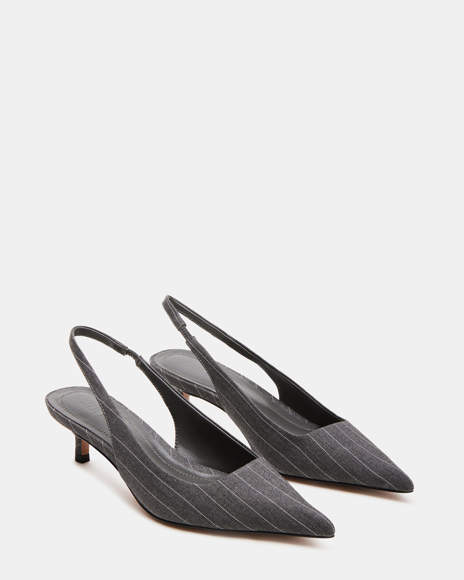 Fashionable slingback heels featuring a pointed toe and stylish pinstripe pattern