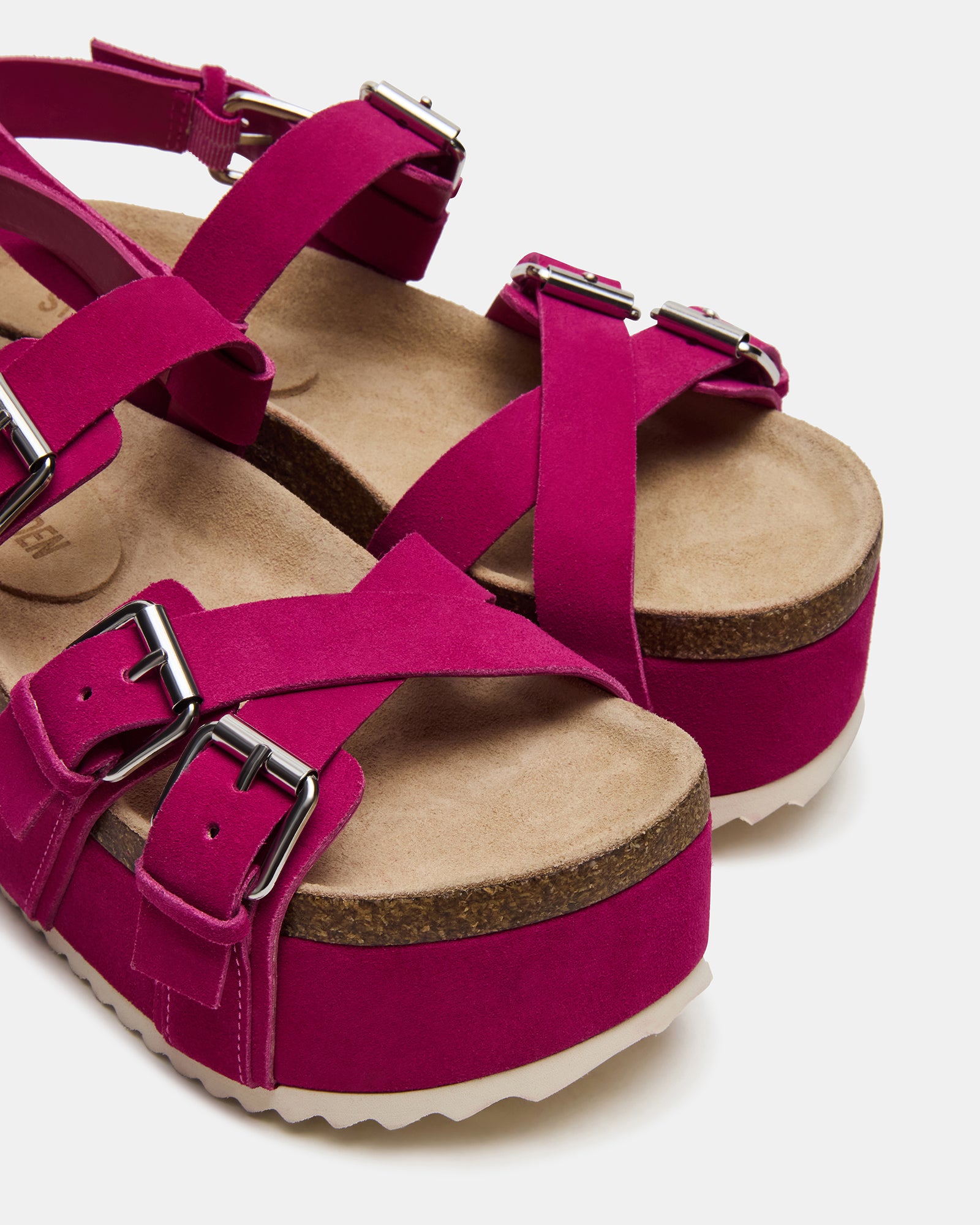 Pink suede womens sandals paired with a summer outfit