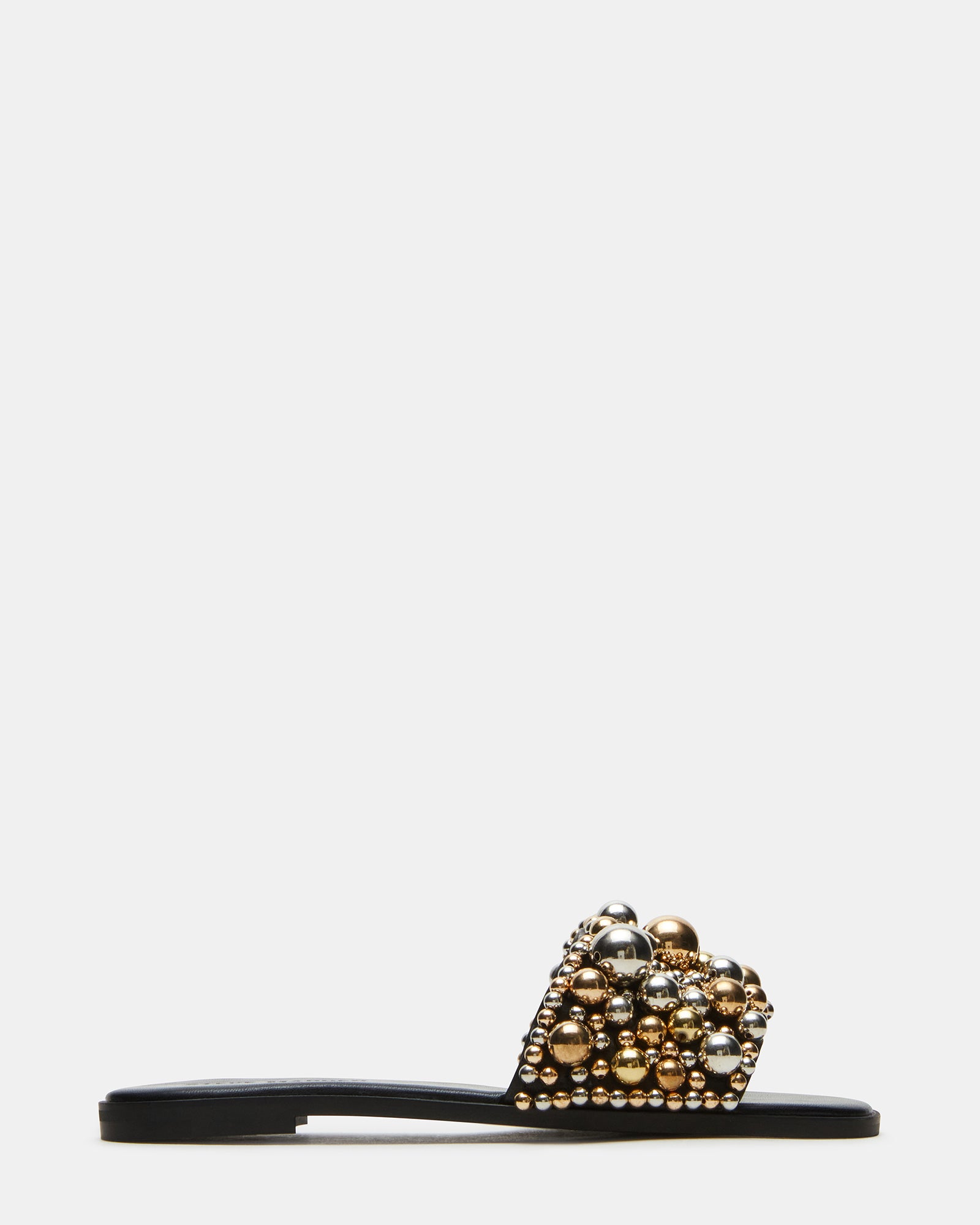 Fashionable KLIO slide sandals with ornament embellishments on a model's feet