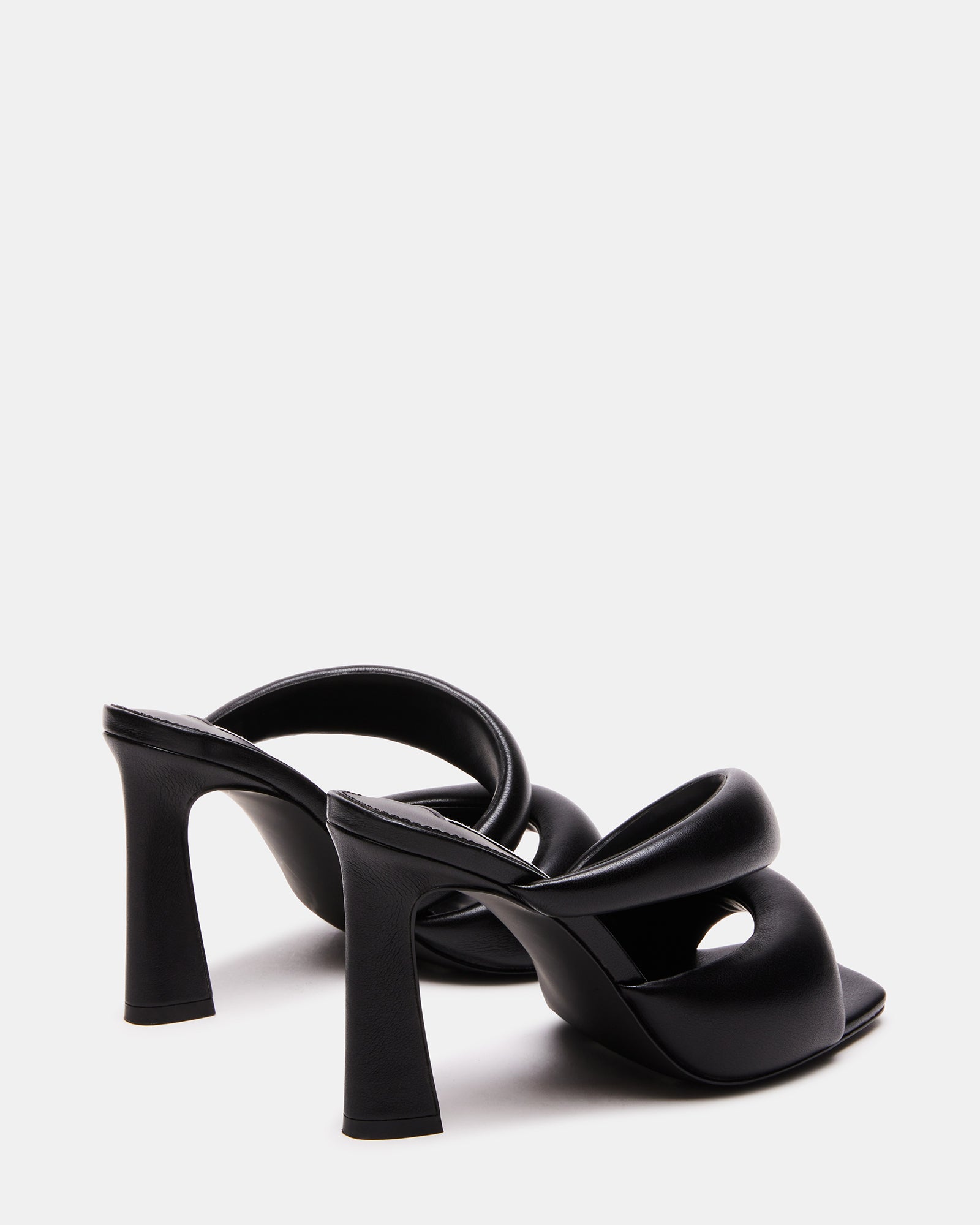 KLOSS Black sandals styled with a casual outfit, perfect for outings.
