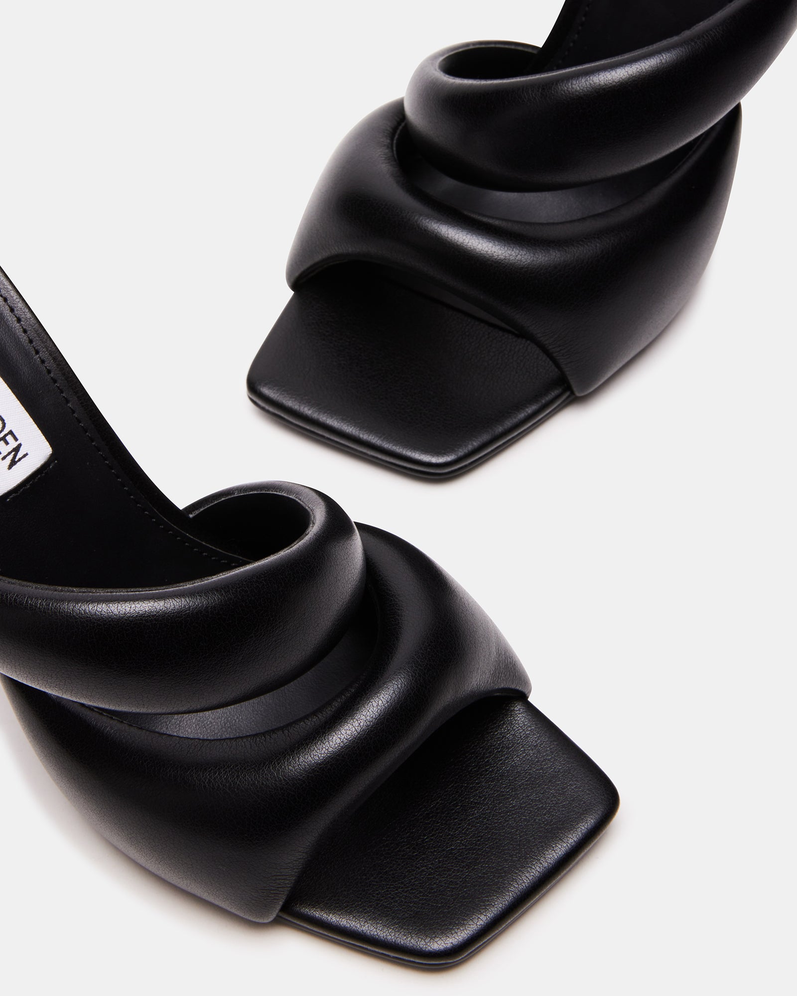 Side view of KLOSS Black vegan leather square toe sandals with puffed straps.