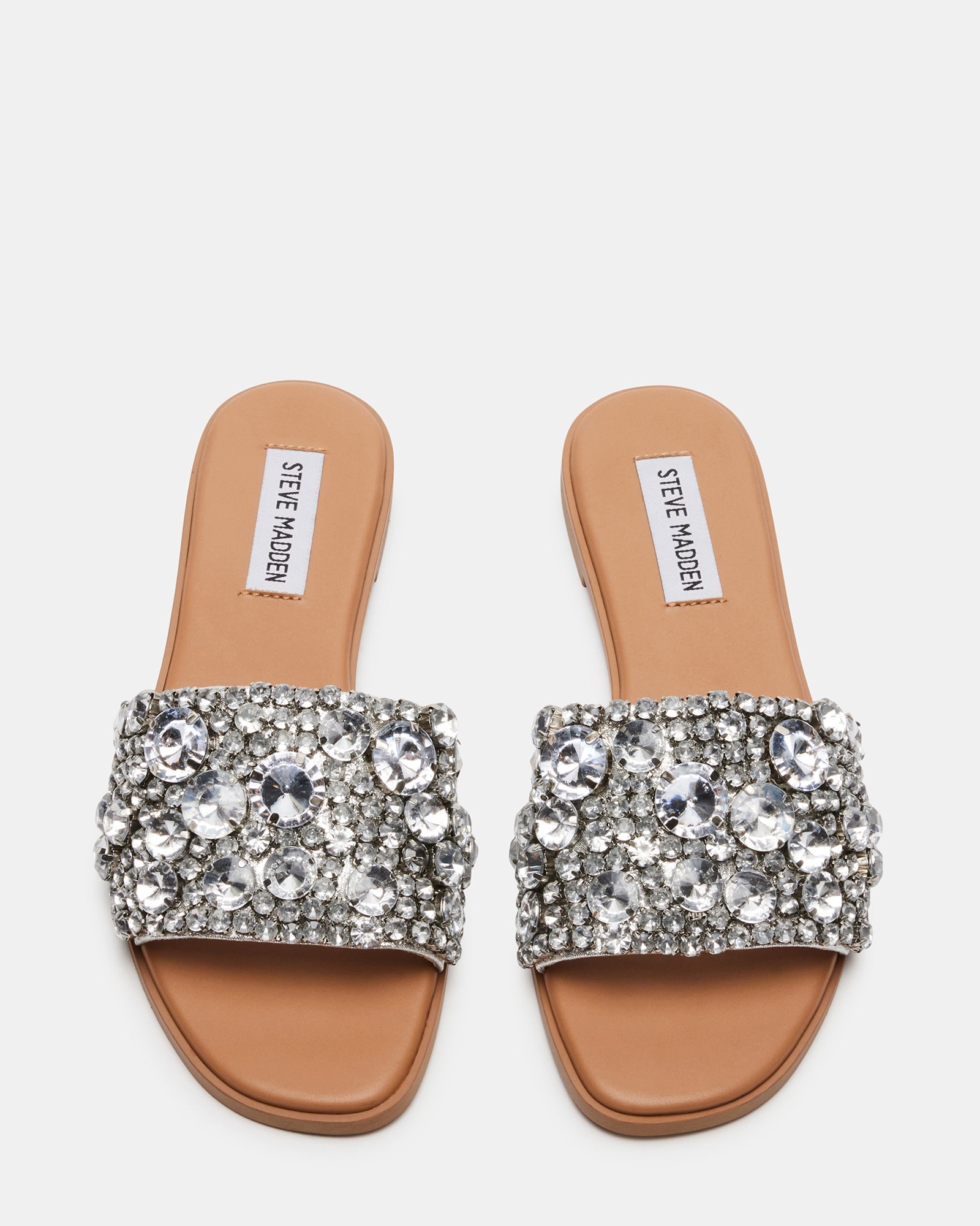 Woman wearing Knicky rhinestone flat sandals with casual summer outfit