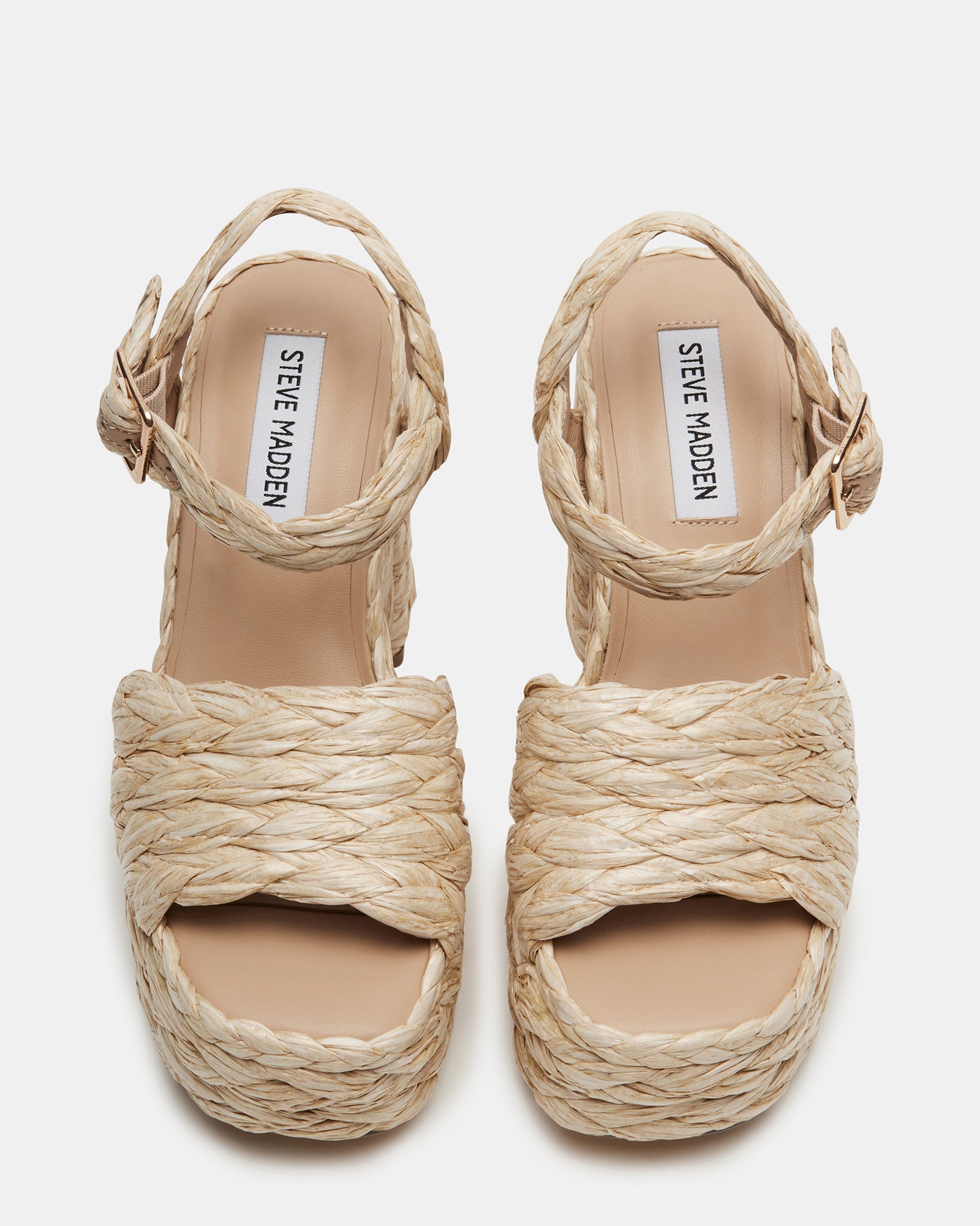 Close-up of Koral Luxe Raffia Platform Heels showcasing the raffia material.