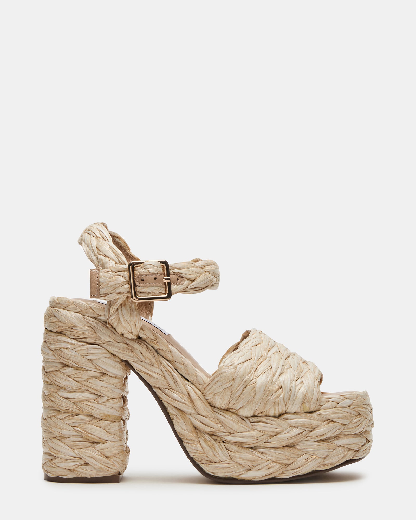 Close-up of Koral Luxe Raffia Platform Heels showcasing the raffia material.