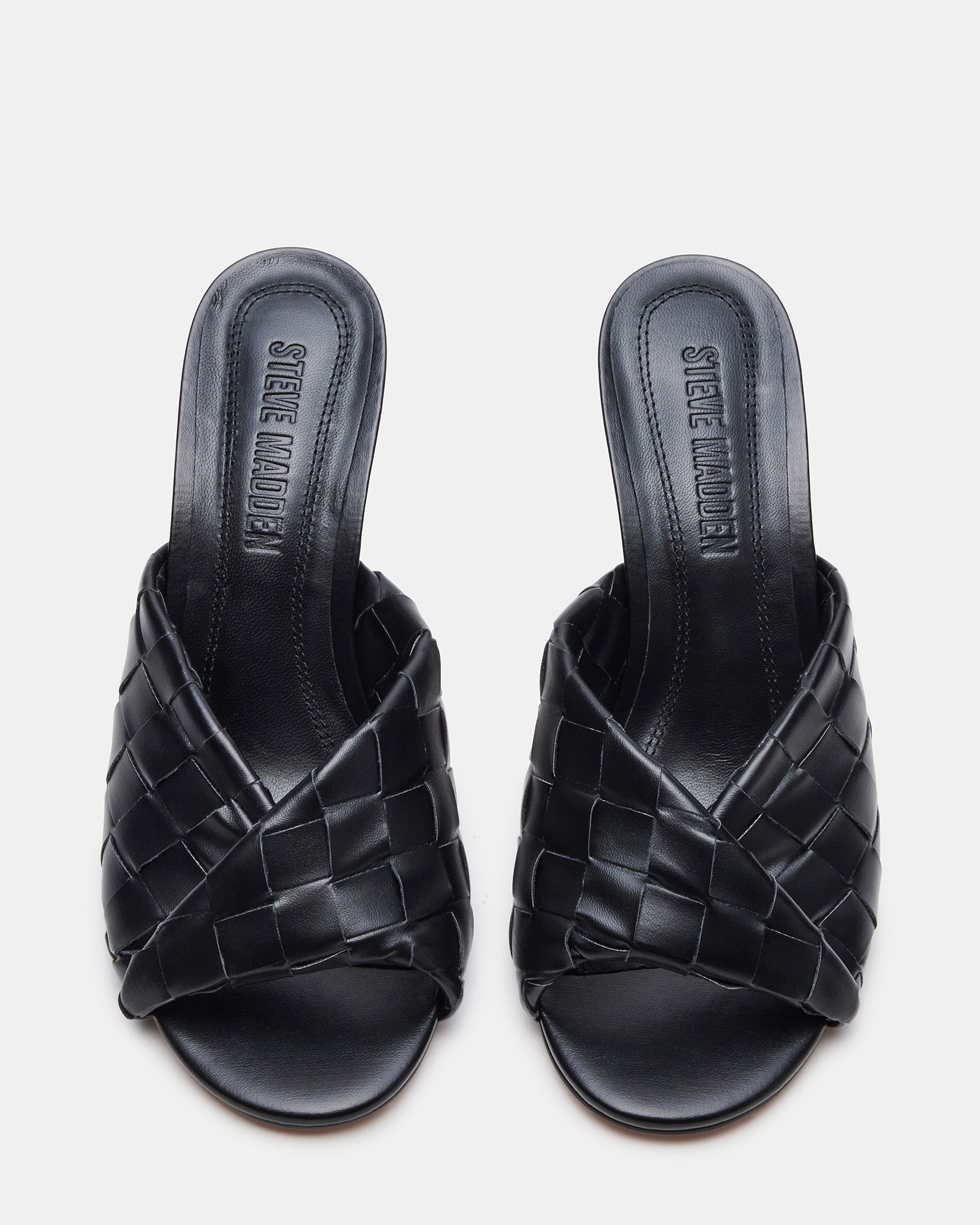 Fashionable black mule shoes with sleek design and comfortable fit