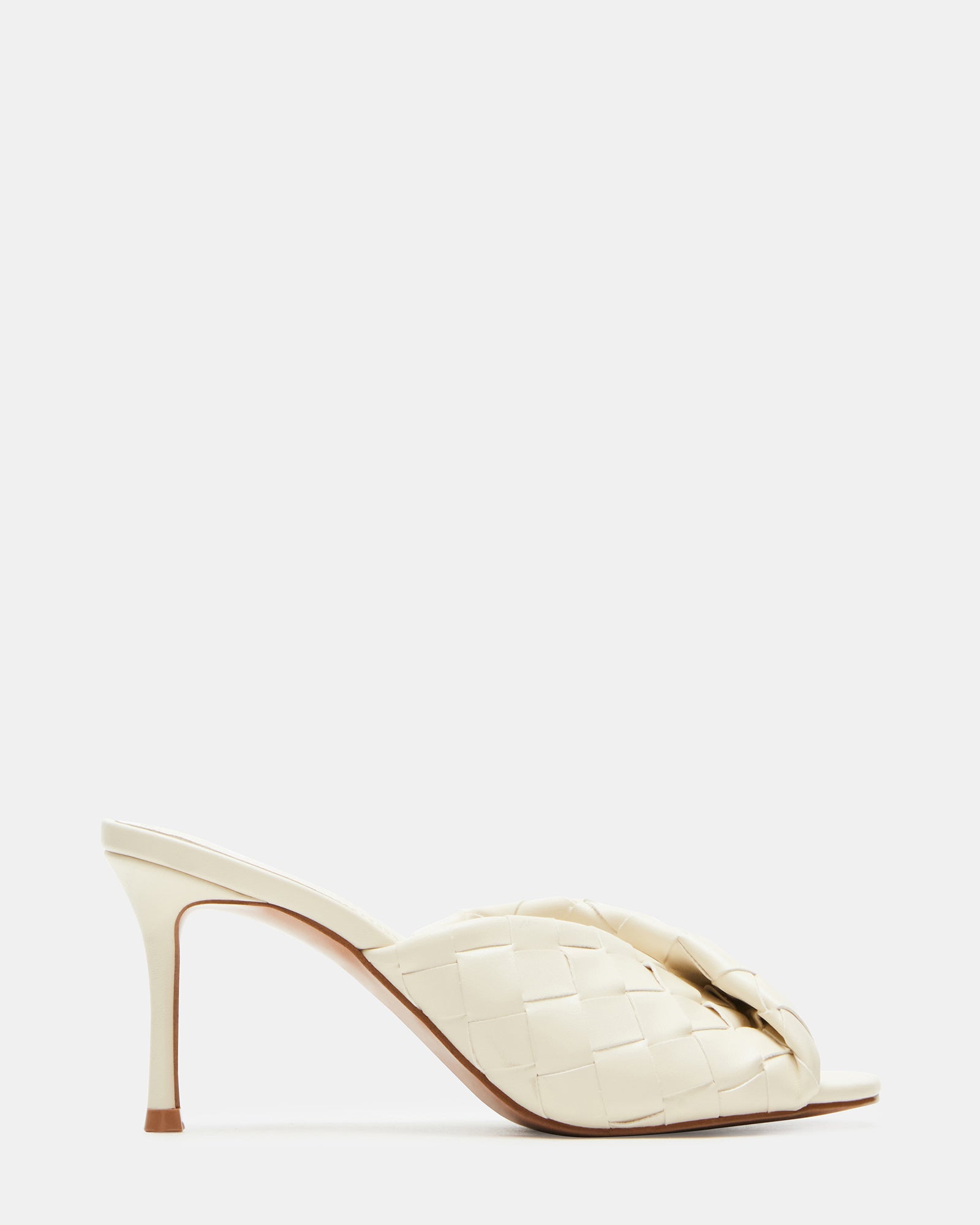 Side view of designer stiletto mules showing 3.25-inch heel height